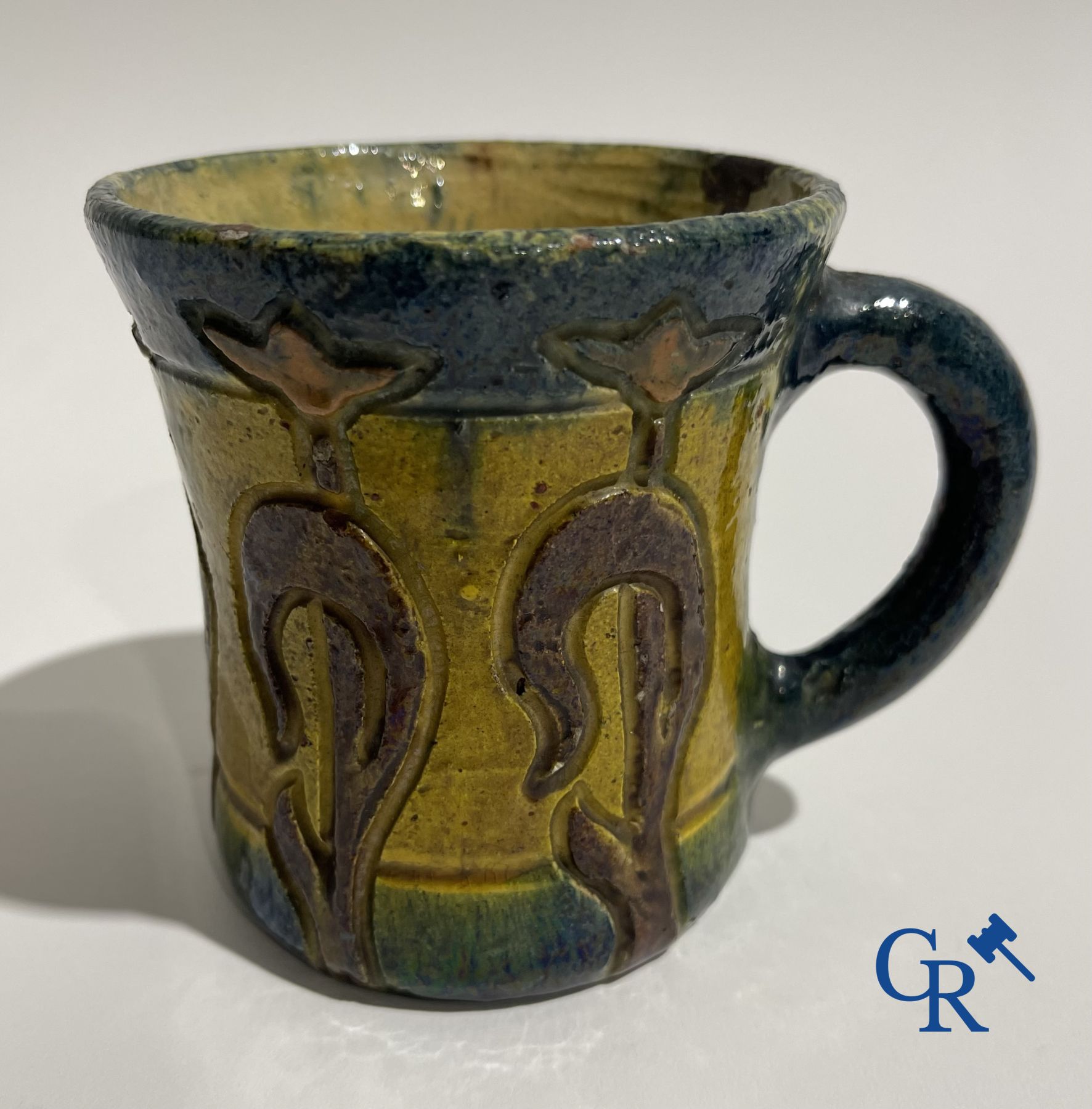 A Torhout tobacco pot Armand Maes-Platteau and a mug in Flemish pottery.