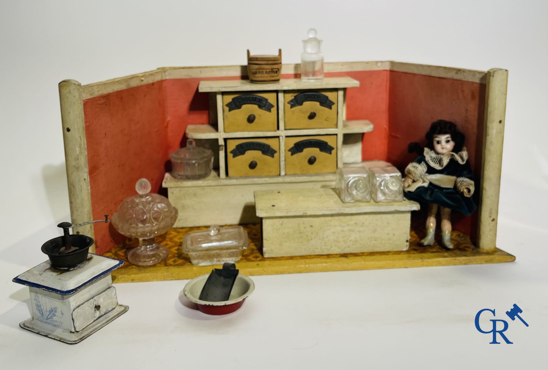 Toys: antique dolls: a lot of 6 dolls with a miniature grocery store attached.