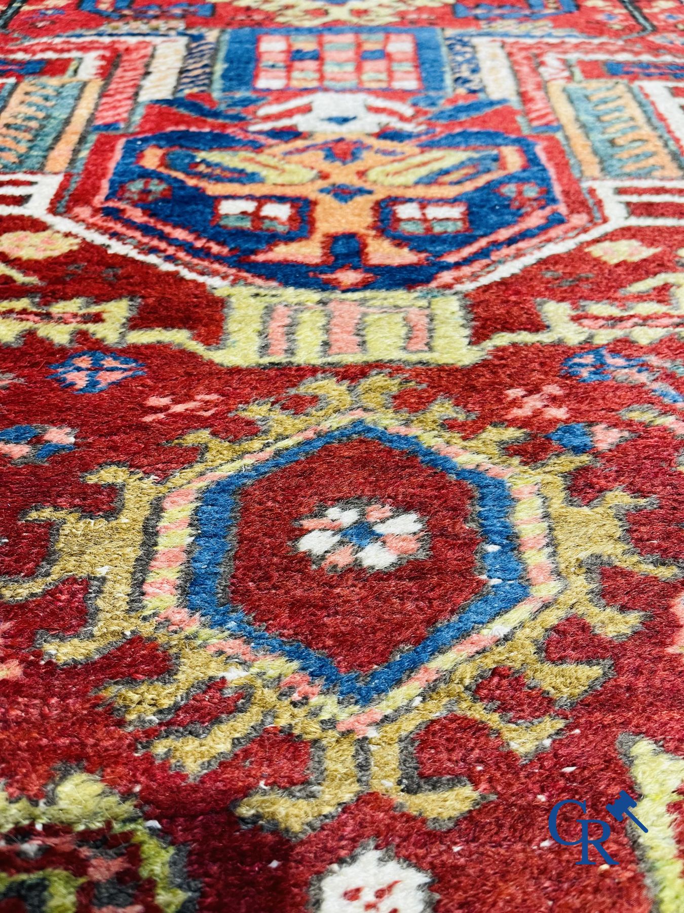 Oriental carpets: An antique oriental runner.