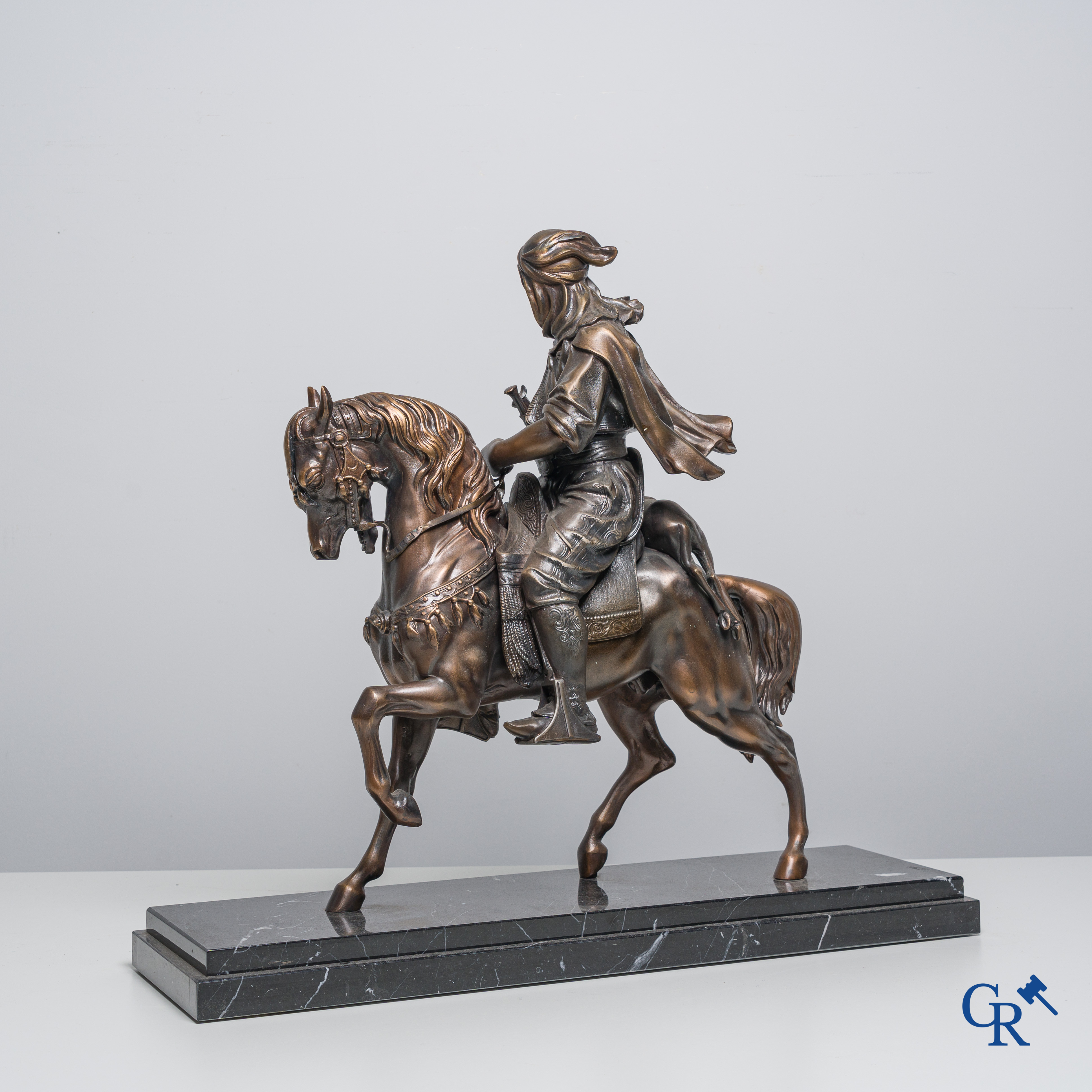 Spelter sculpture on a black marble pedestal, Arabian rider on horseback. 20th century.