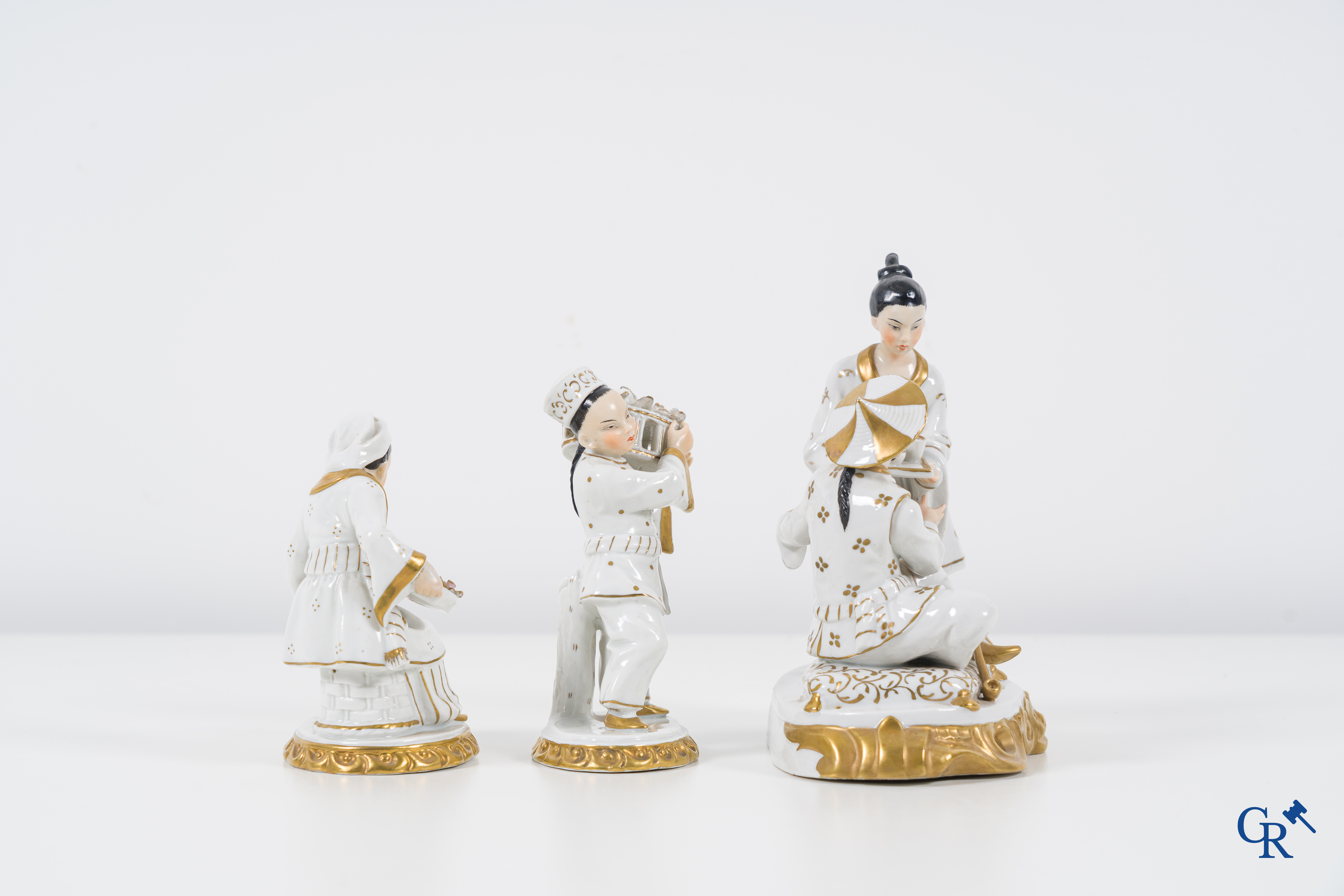 European porcelain: Sitzendorf, 3 groups in fine Sitzendorf porcelain with Asian representations.