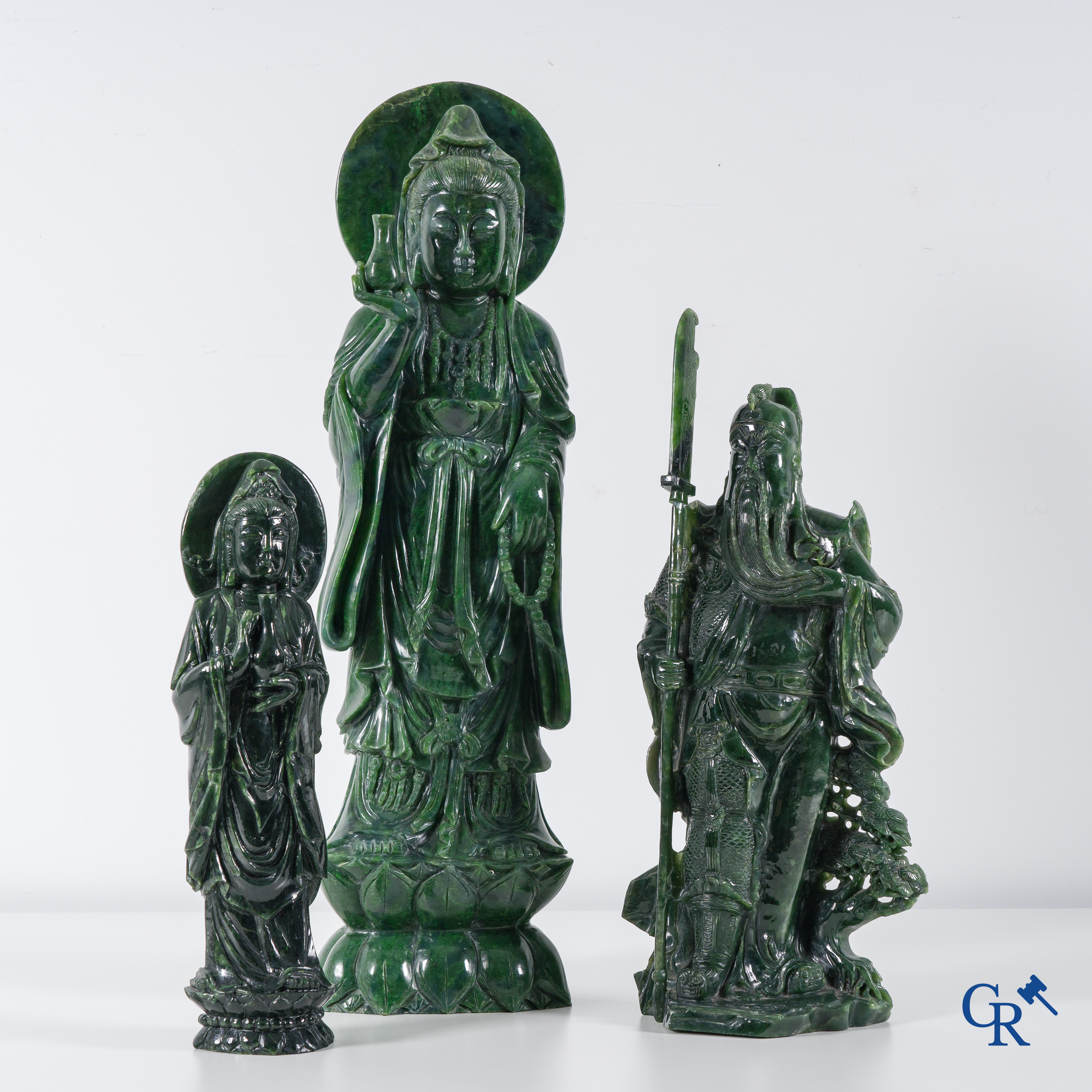 Asian Art: 3 Chinese jadeite figures of a standing Guanyin and a Chinese warrior. 20th century.