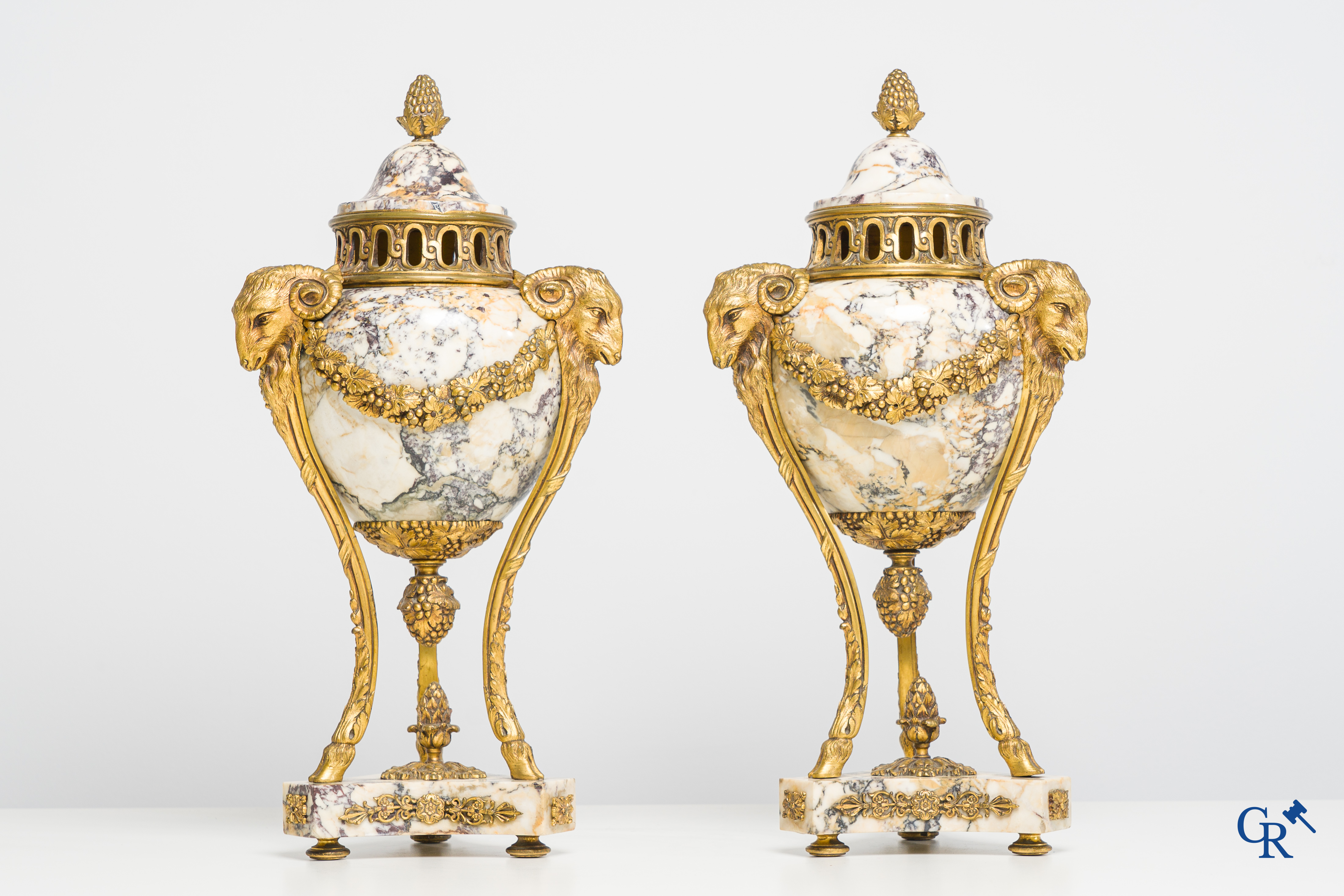 Pair of cassolettes in marble brèche violette with finely decorated and gilded bronze frames. Louis XVI style. 