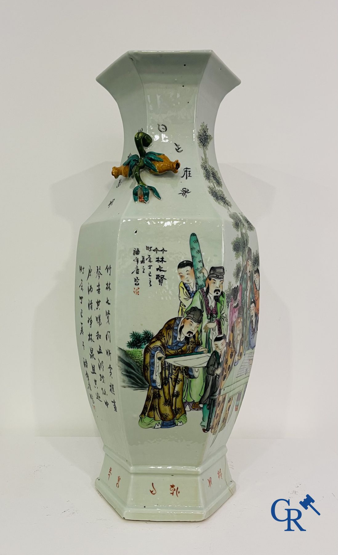 Asian Art: Chinese porcelain. A hexagonal Chinese Famille rose vase with sages and scholars. 19/20th century.