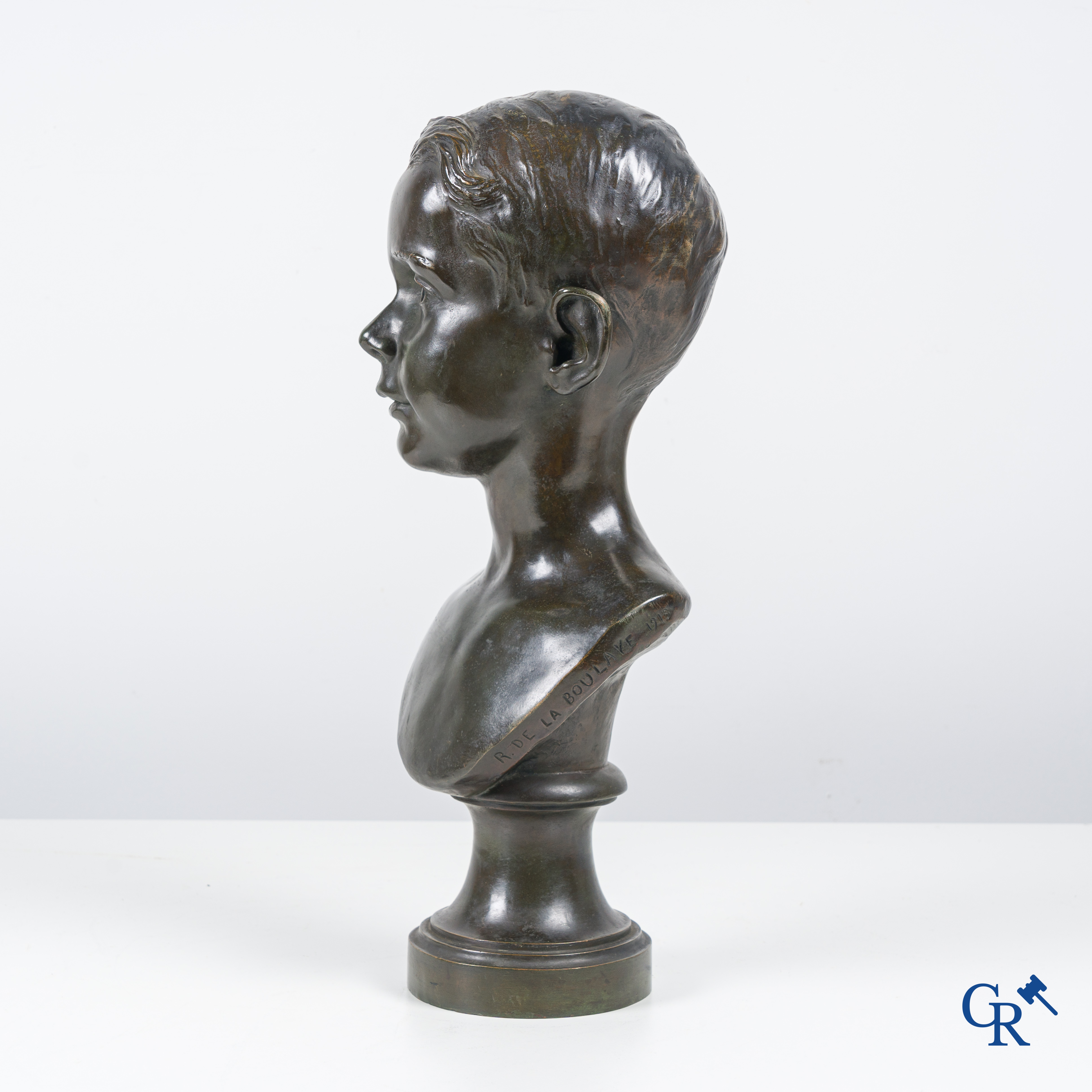 R. De La Boulaye, Bronze bust of a young man. Signed and dated 1913.