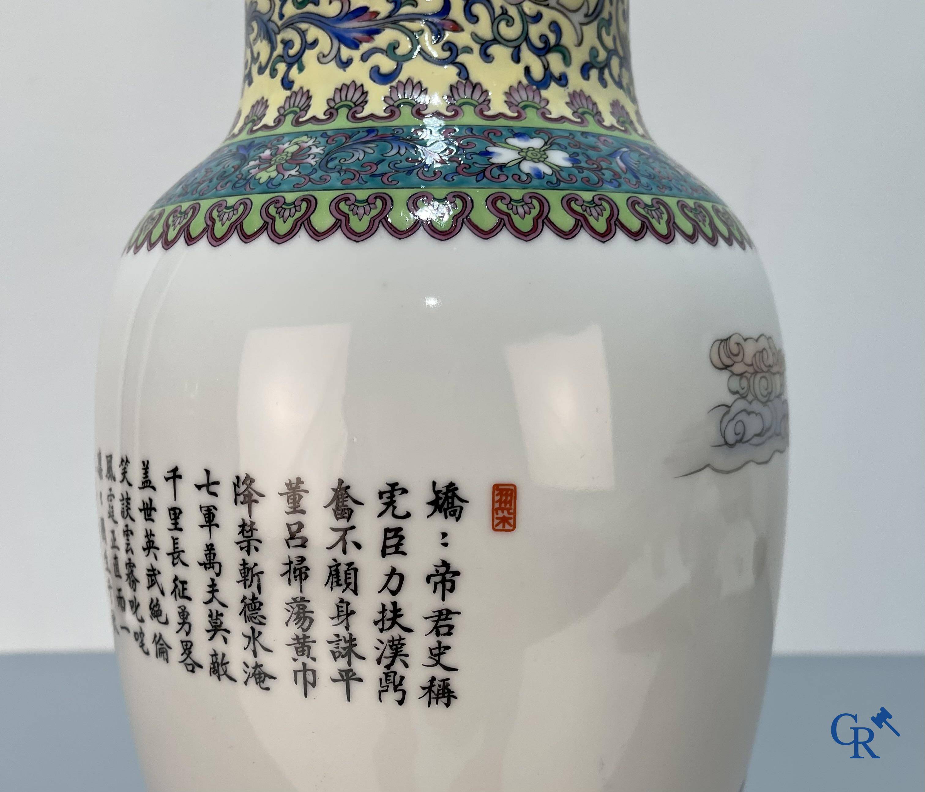 Asian Art, A finely decorated Chinese vase with a warrior on a horseback and calligraphy. Marked. 20th century.