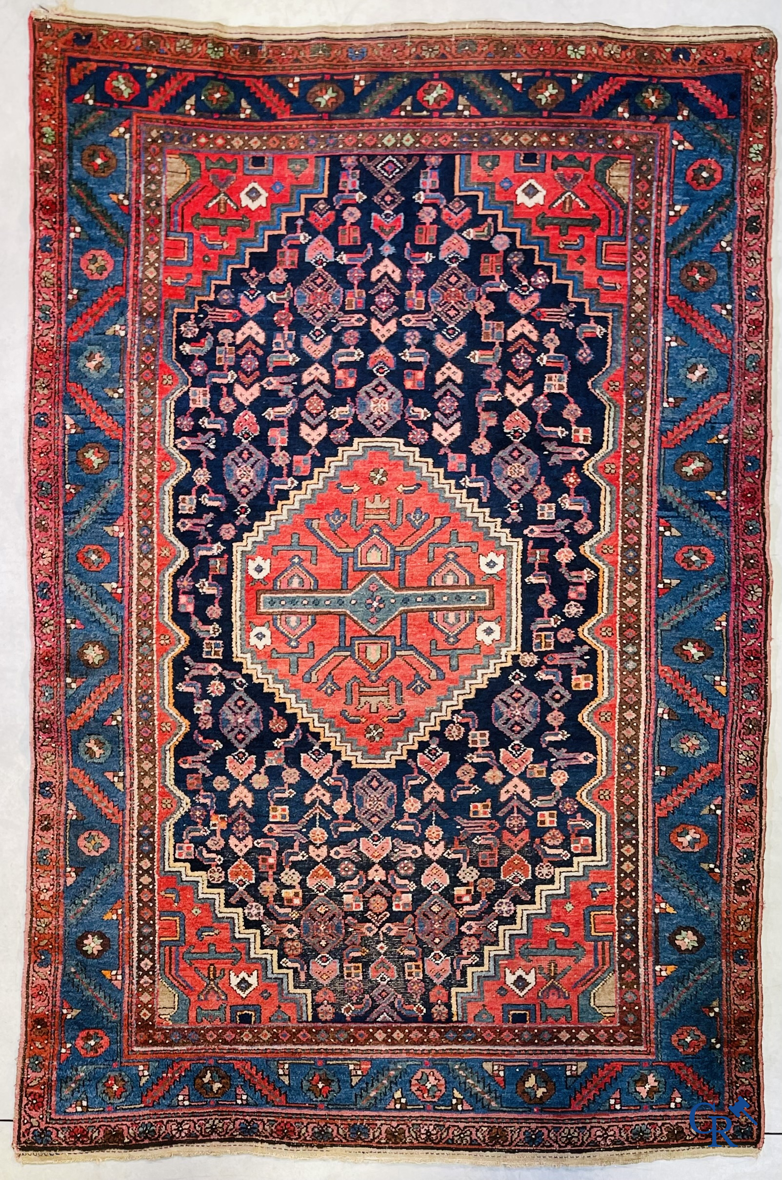 Oriental carpets, 2 antique hand-knotted Oriental carpets.