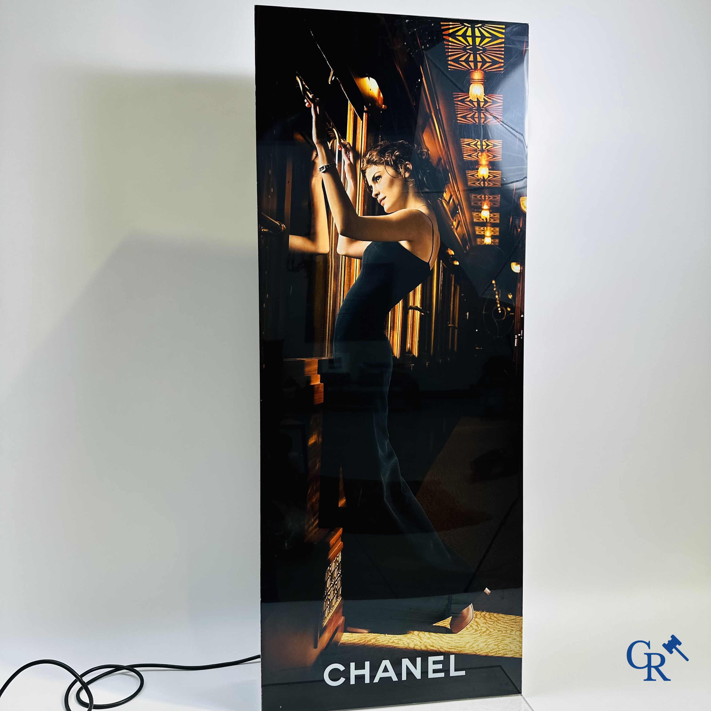 Chanel: Light advertising in plexiglass for Chanel N°5 with an image of the French actress Audrey Tautou.