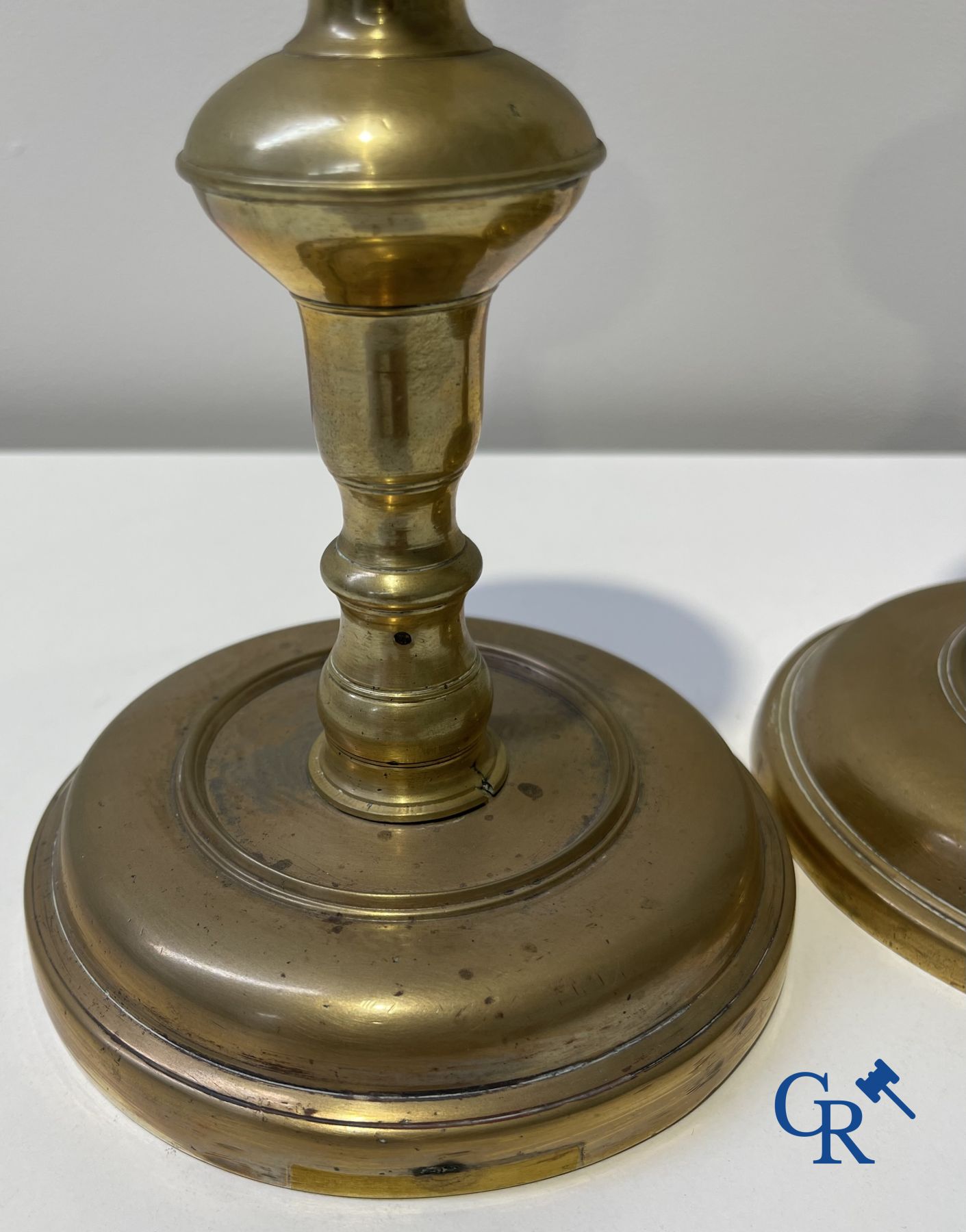 A lot of 2 large baptismal dishes, a portrait dish, 2 candlesticks and a holy water bucket. 16th-17th century.