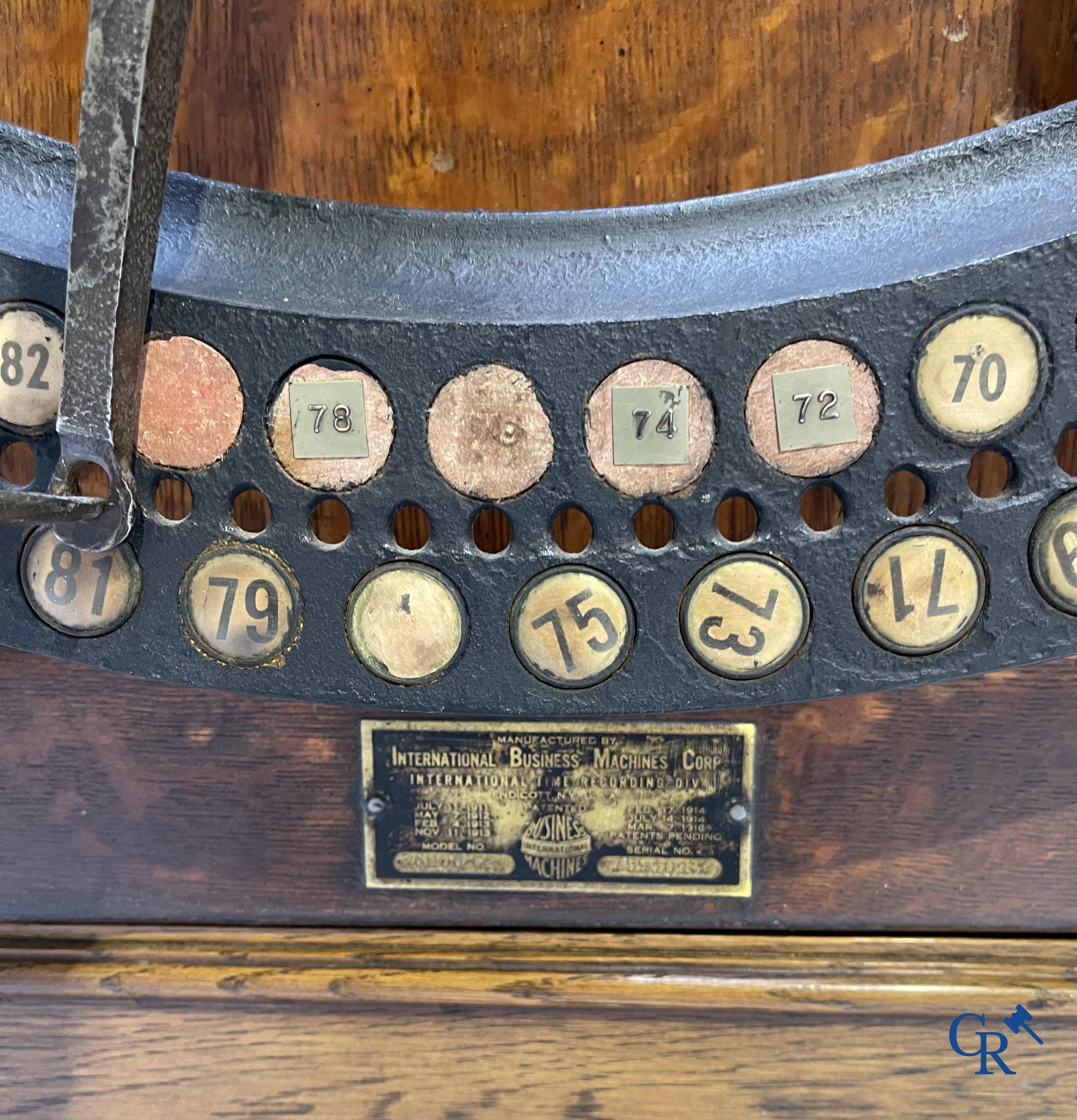 "International" Watson Business Machines Corporation of Belgium. A time clock with cast iron wheel. Circa 1900.