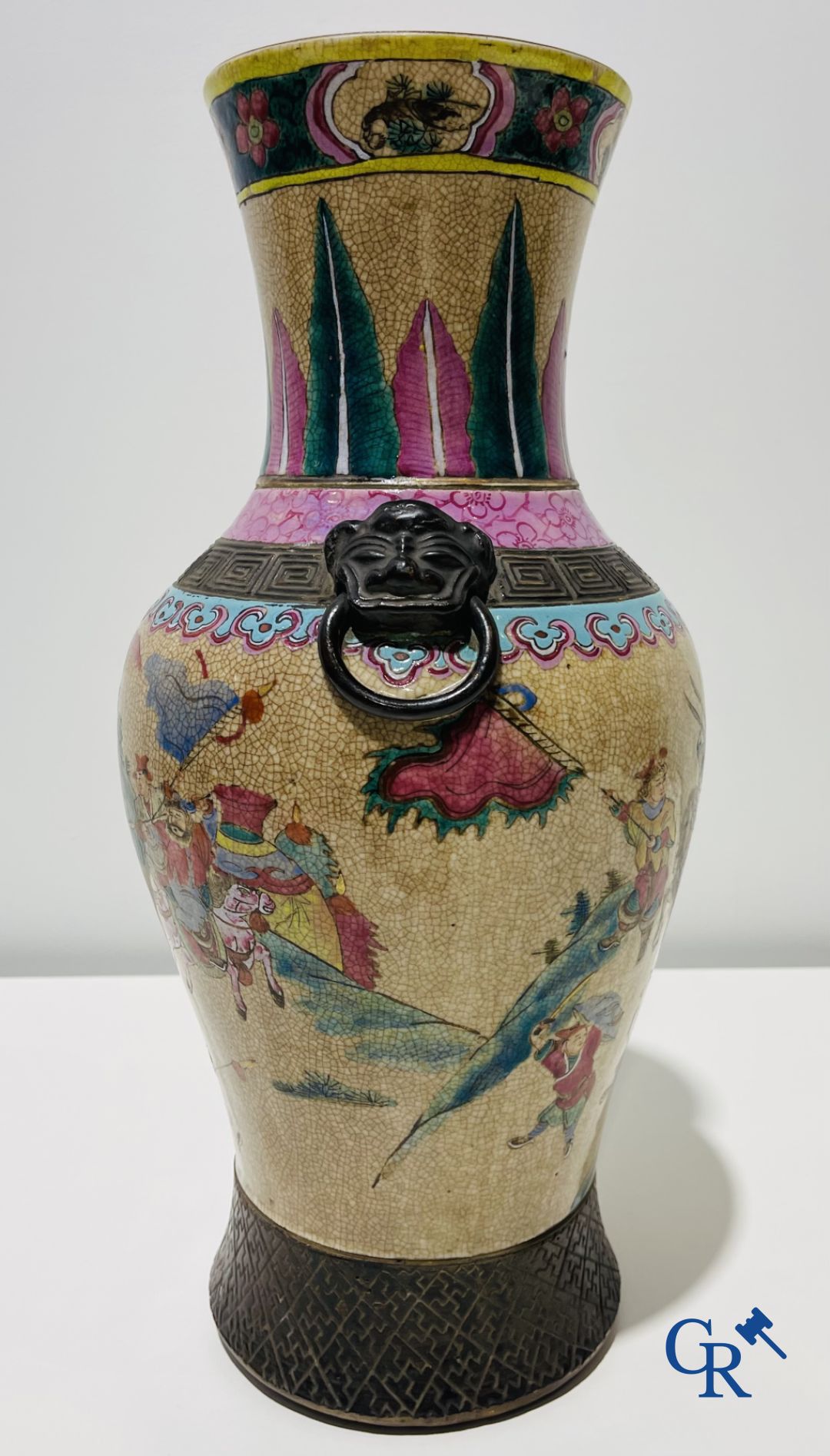 Asian art: A Chinese Nanking famille rose crackle vase with warrior decor. 19th century.