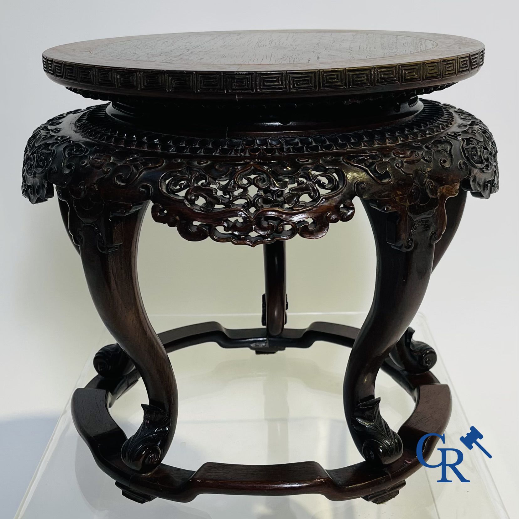 Asian art: A finely carved Chinese hardwood pedestal.