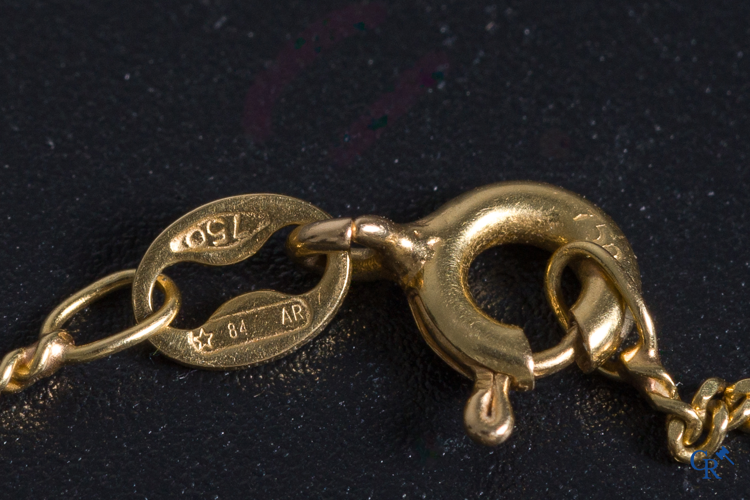 Jewellery: 2 rings and a necklace in gold 18K (750°/00).