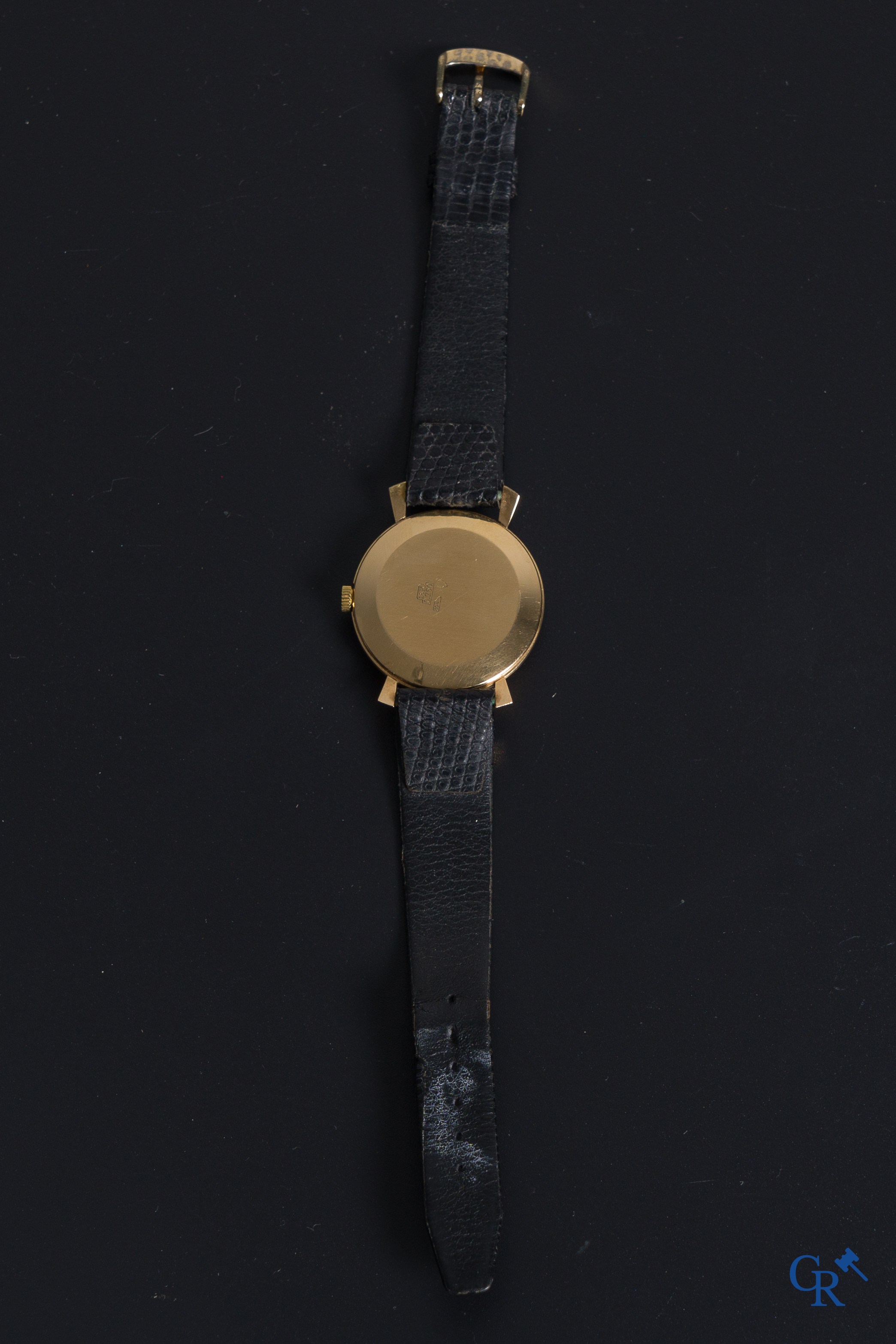 Watches: Sully, A men's wristwatch in gold 18K (750°/00).