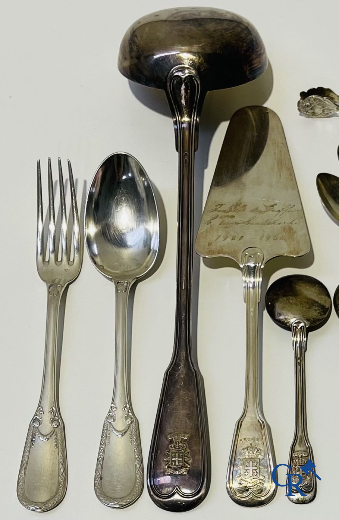 Silver: A lot of silver cutlery, a cake scoop and others including Delheid.