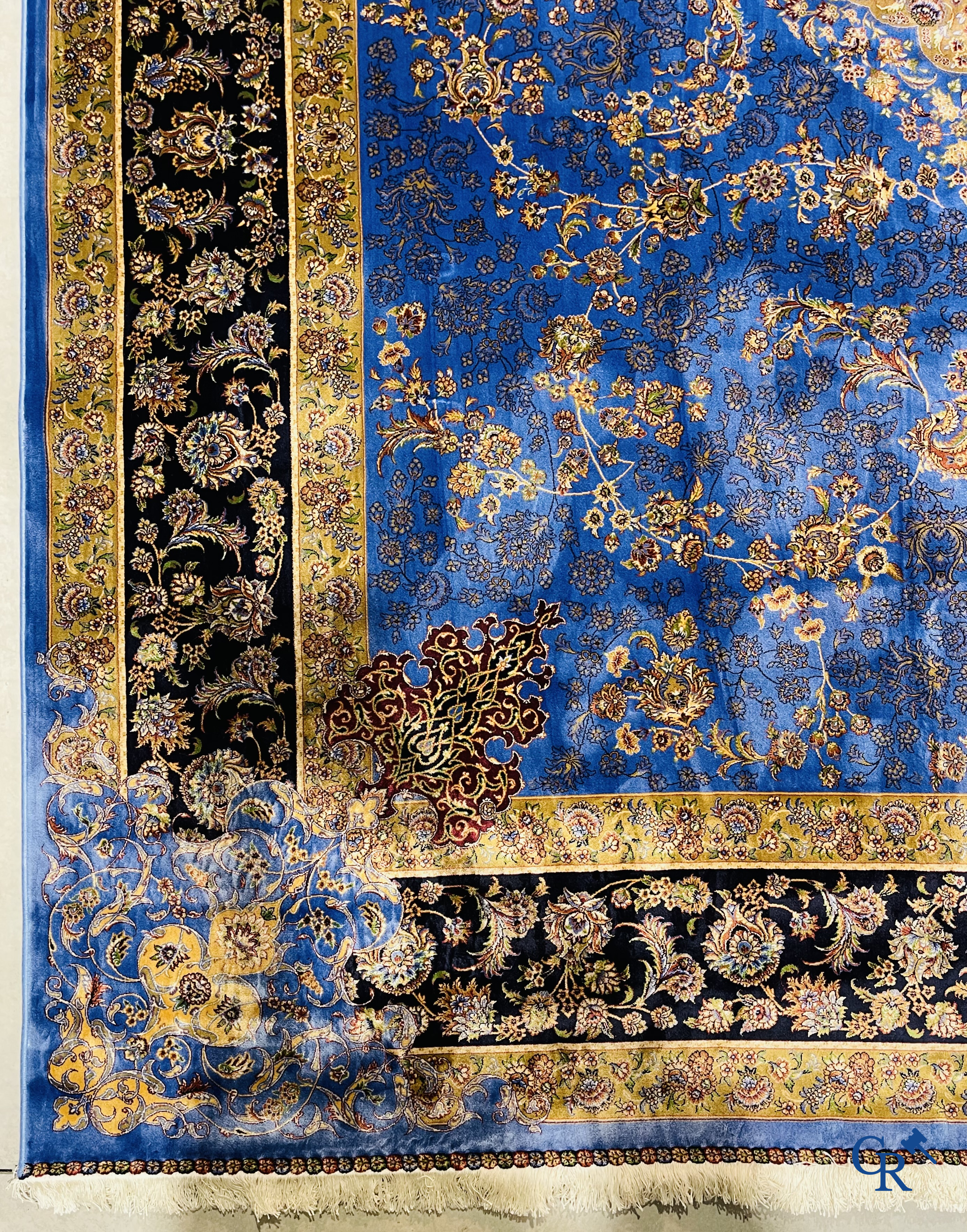 Carpets. Exceptional silk carpet with floral decor on a blue background.