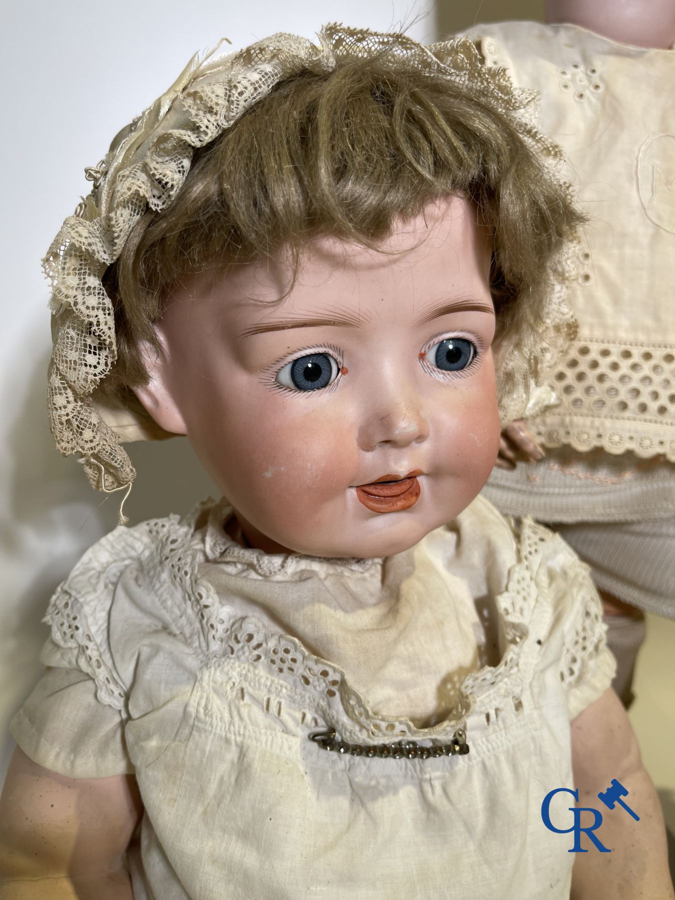 Toys: antique dolls: a lot of 3 antique dolls with porcelain head.