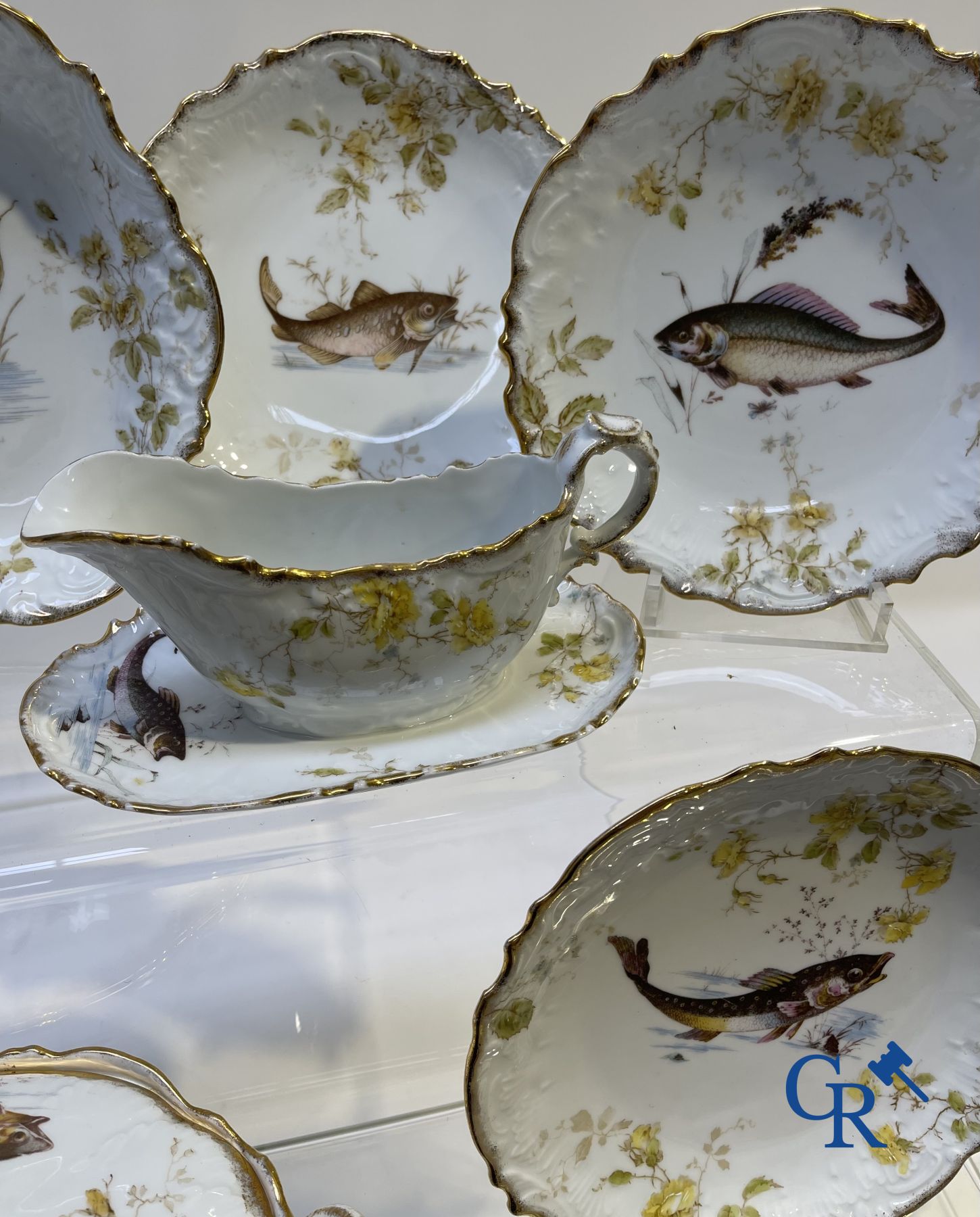 Extraordinary tableware in Brussels porcelain with a theme of freshwater fish.