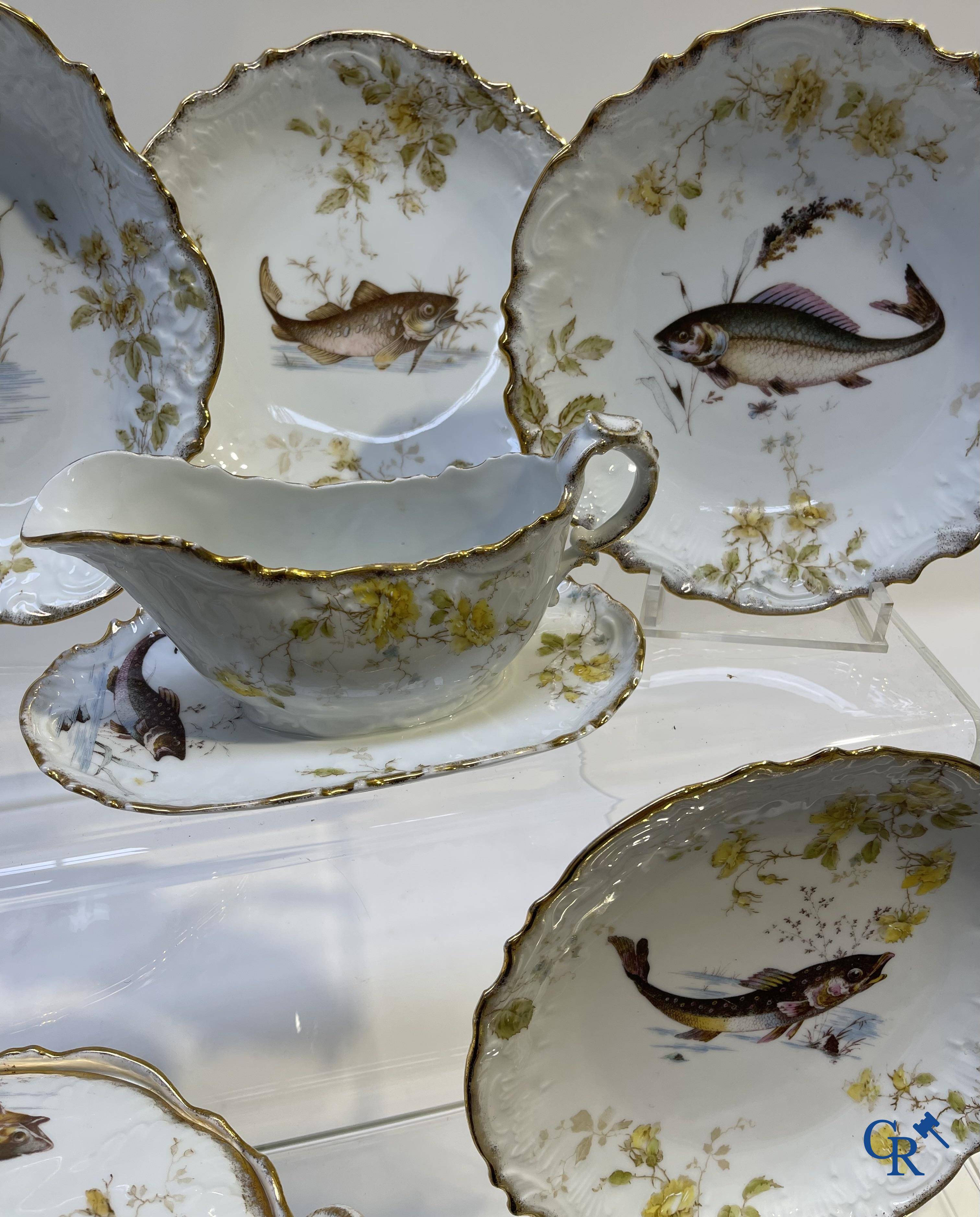 Extraordinary tableware in Brussels porcelain with a theme of freshwater fish.