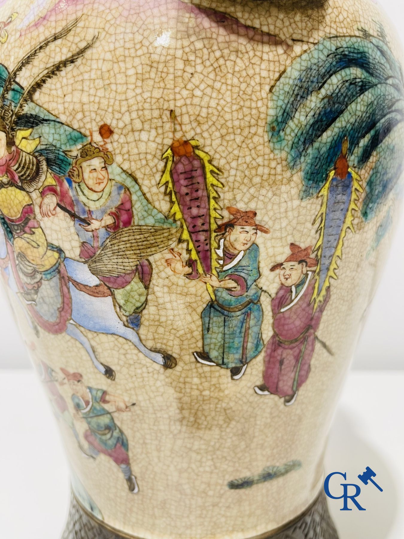 Asian art: A Chinese Nanking famille rose crackle vase with warrior decor. 19th century.