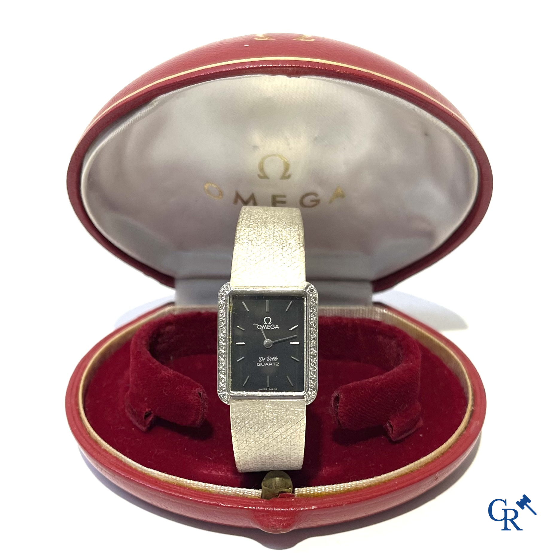 Omega De Ville, damespolshorloge in wit goud 750°/00 en kleine briljanten. Quartz. Zwitsers werk.