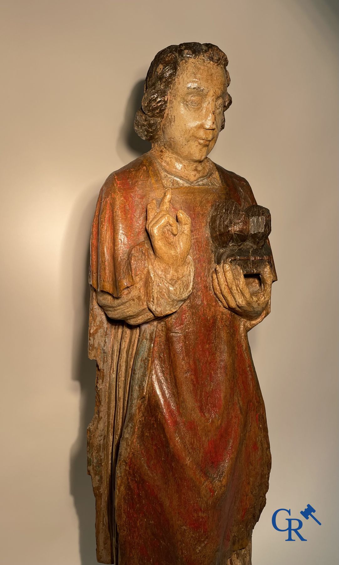 Wooden sculpture: Polychrome wood sculpture of a saint. Saint Stephen. Probably 17th century.