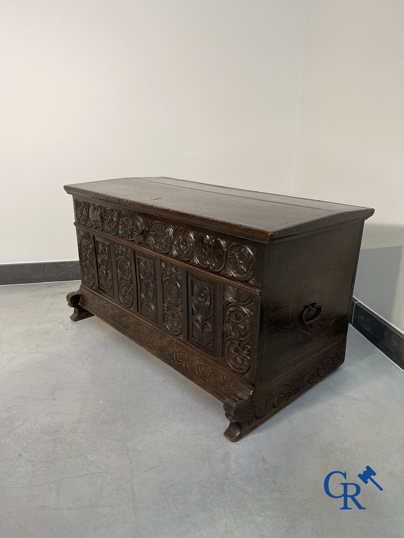 Furniture: Large sculpted oak chest. England, dated 1810.