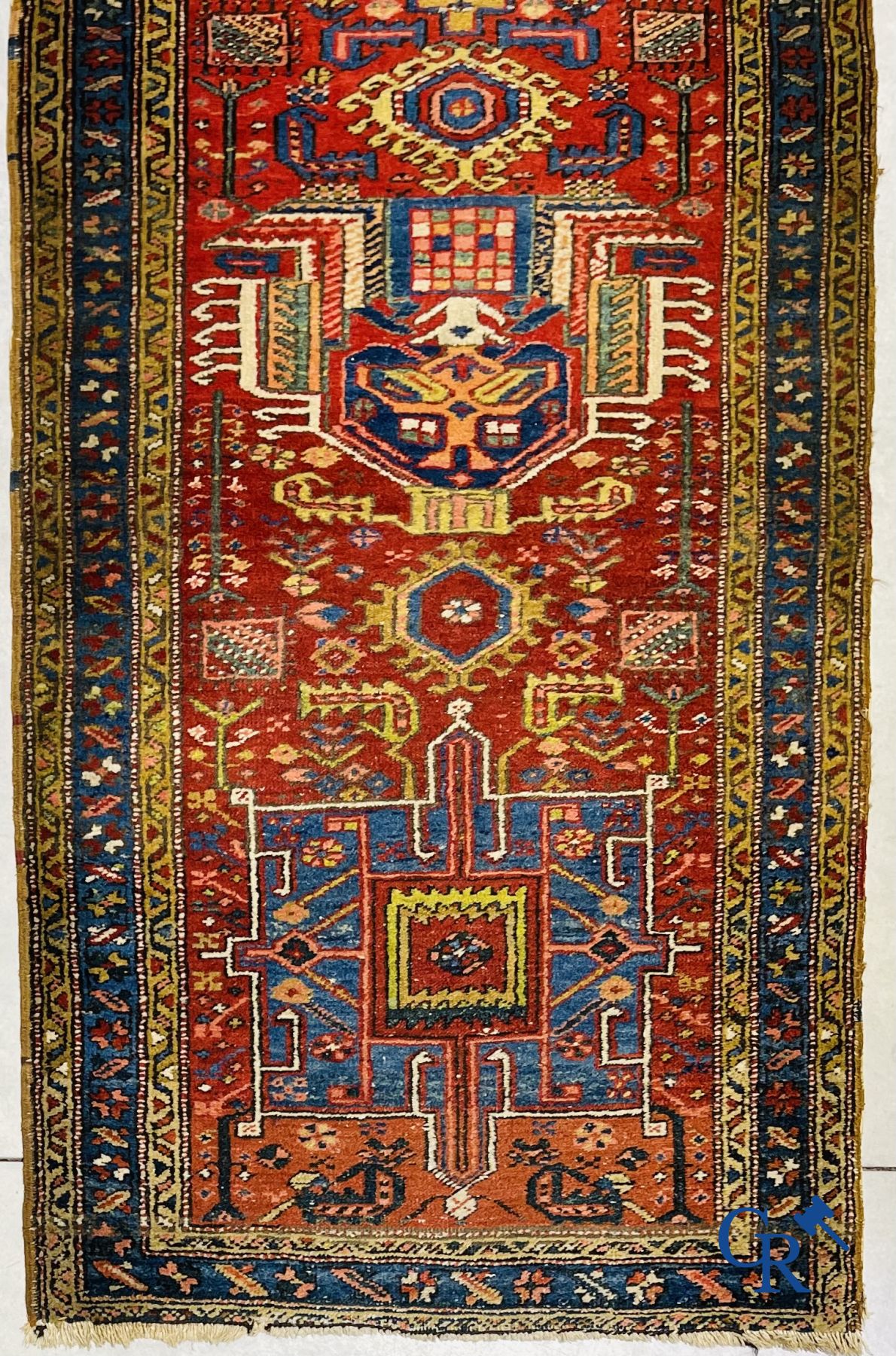 Oriental carpets: An antique oriental runner.