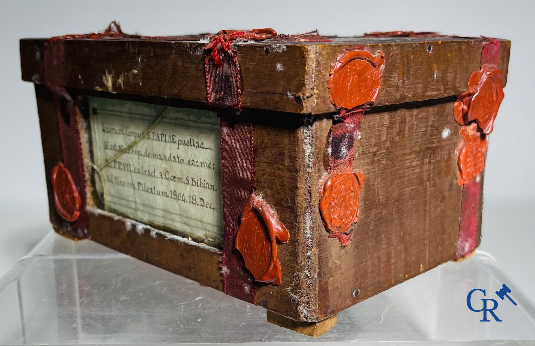 An antique wooden reliquary sealed with wax seals. Early 19th century.