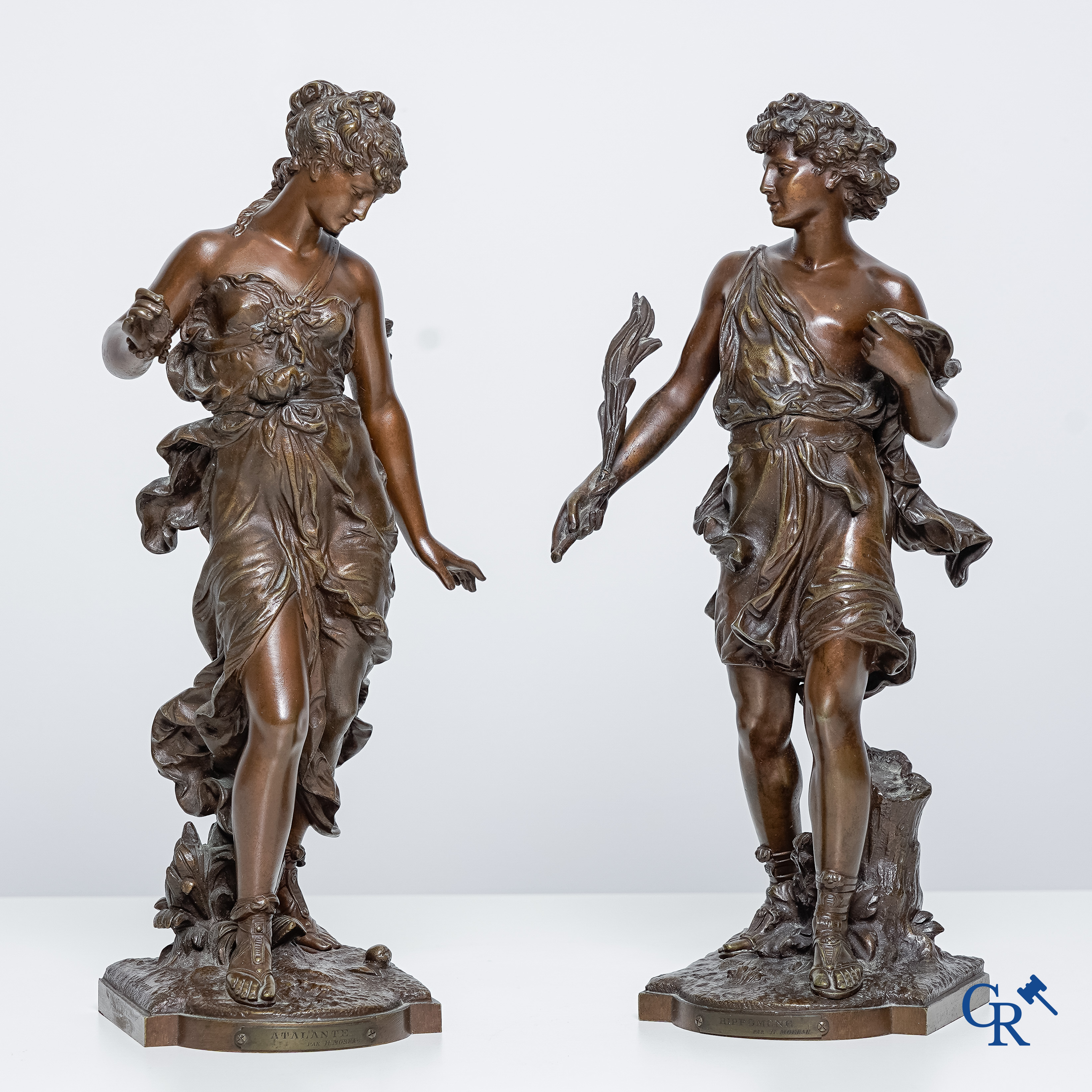 Hippolyte Moreau (1832-1927) Hippomène et Atalante. Paire de statues en bronze à la patine brune.