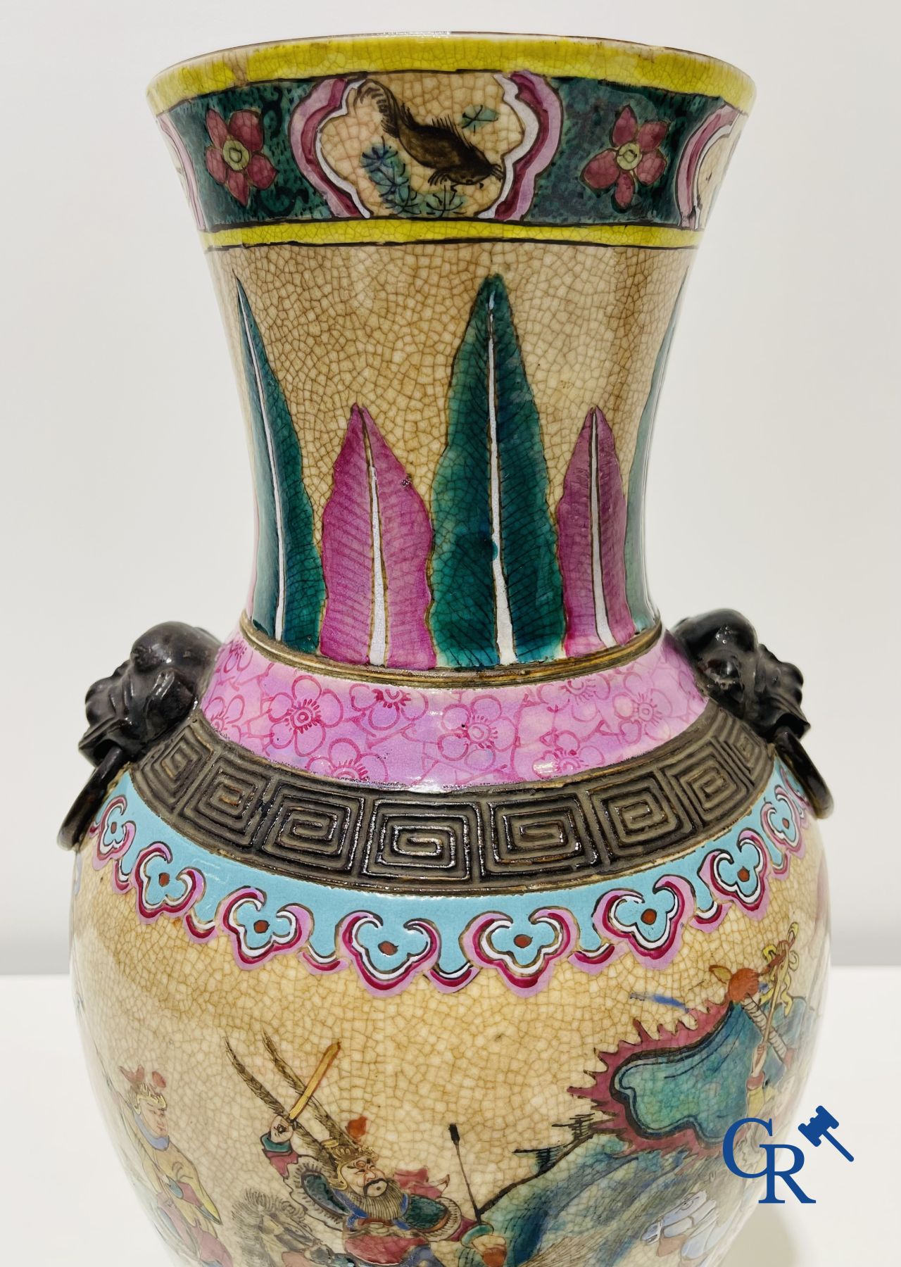 Asian art: A Chinese Nanking famille rose crackle vase with warrior decor. 19th century.