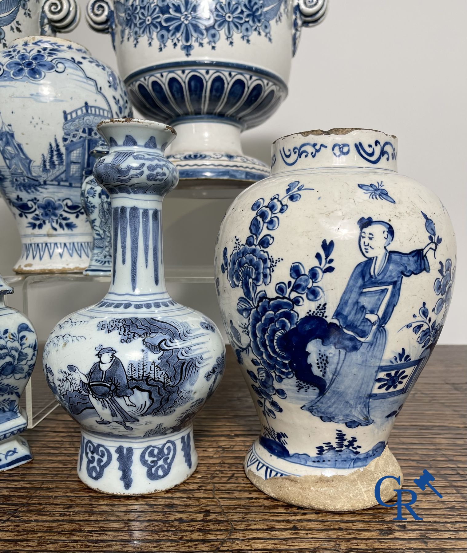 Delft: 11 pieces of blue and white faience with different décors. 17th - 18th century.