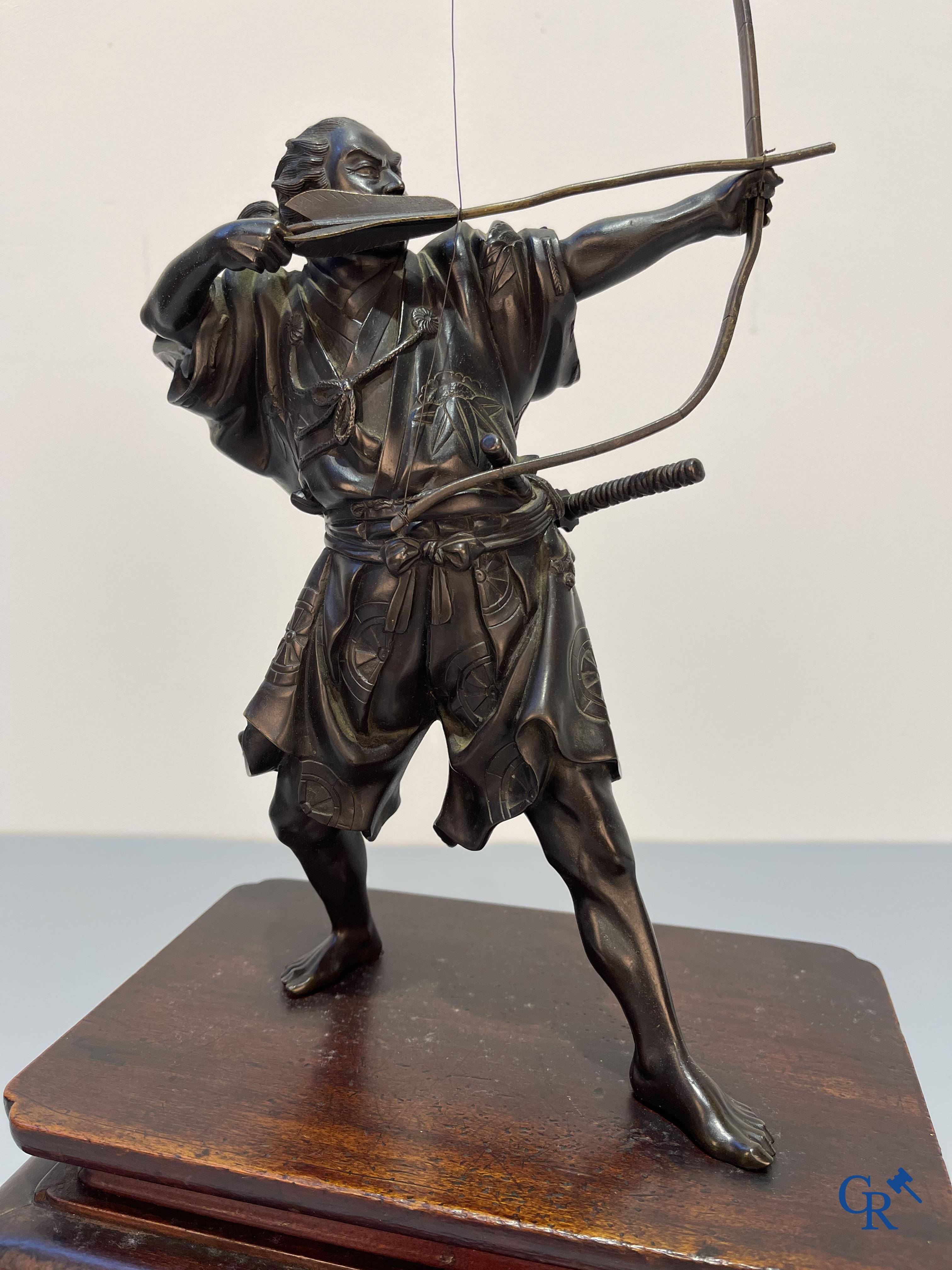 Asian Art, Japanese art, a bronze representation of a Samurai archer. Signed. Meiji period.