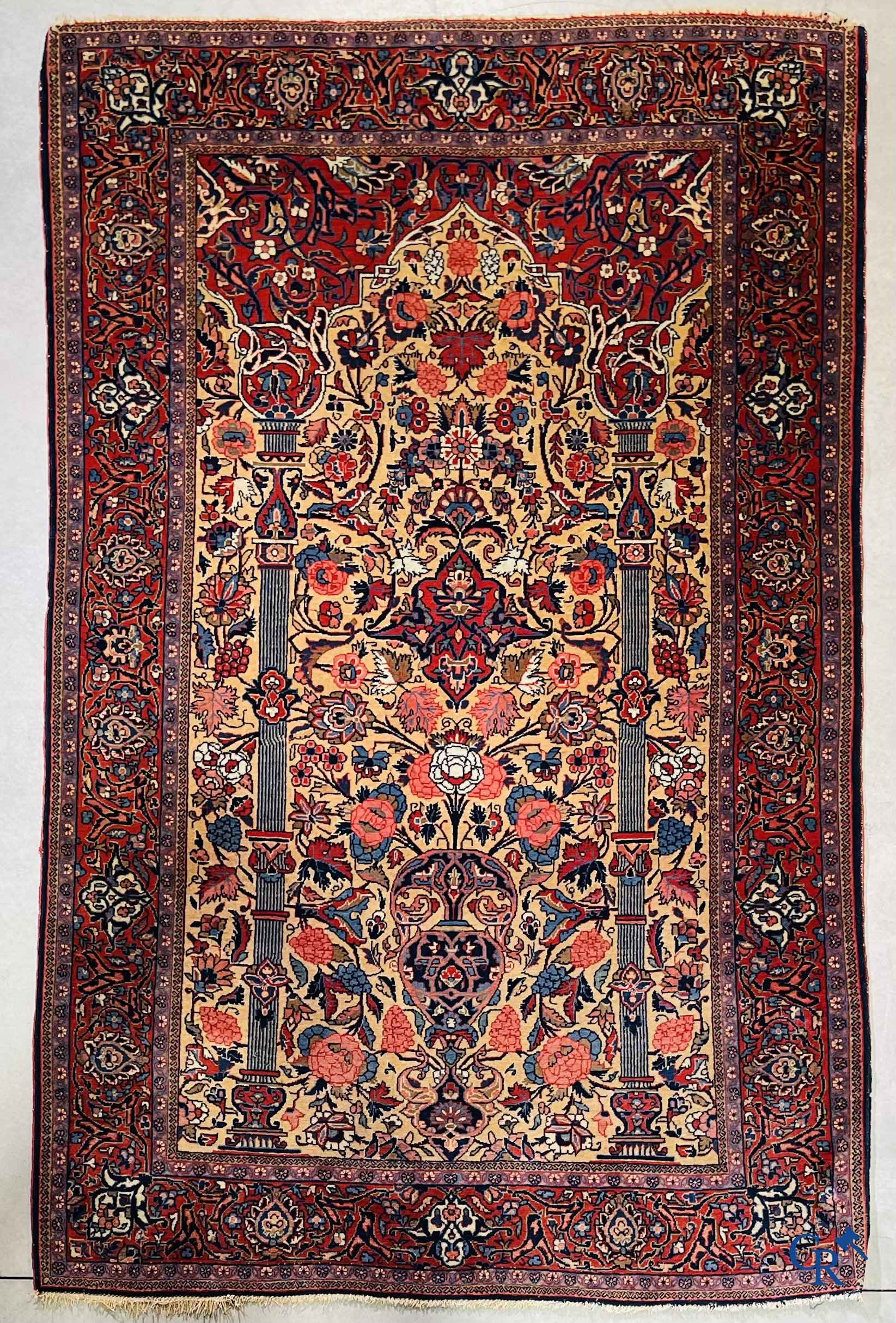 Oriental carpets: Iran. 2 antique hand-knotted Persian carpets with floral decor.