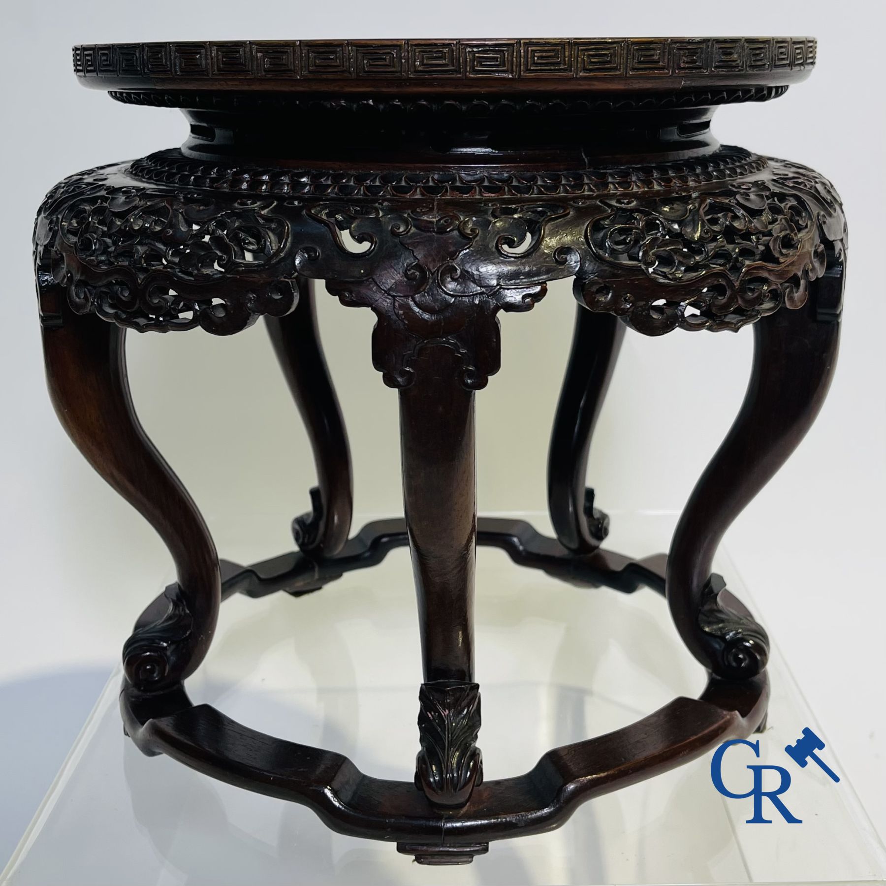 Asian art: A finely carved Chinese hardwood pedestal.