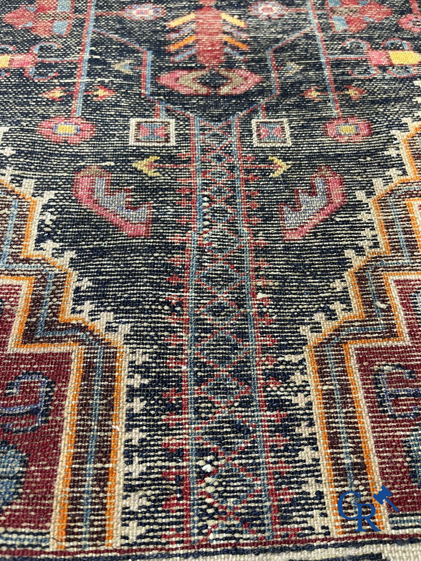 Oriental carpets: Oriental hand-knotted wool carpet.