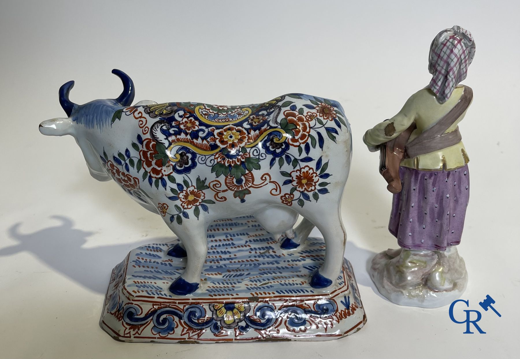 A part of a North French fountain and various pieces in faience and various antiques.