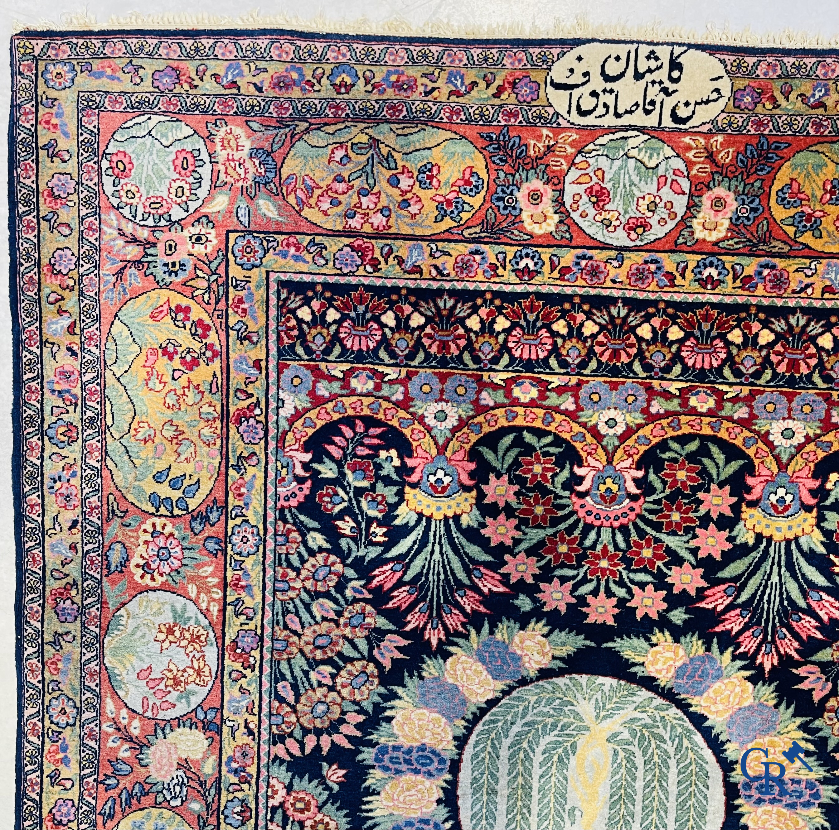 Oriental carpets: A finely knotted Oriental carpet with floral decor. Signed.