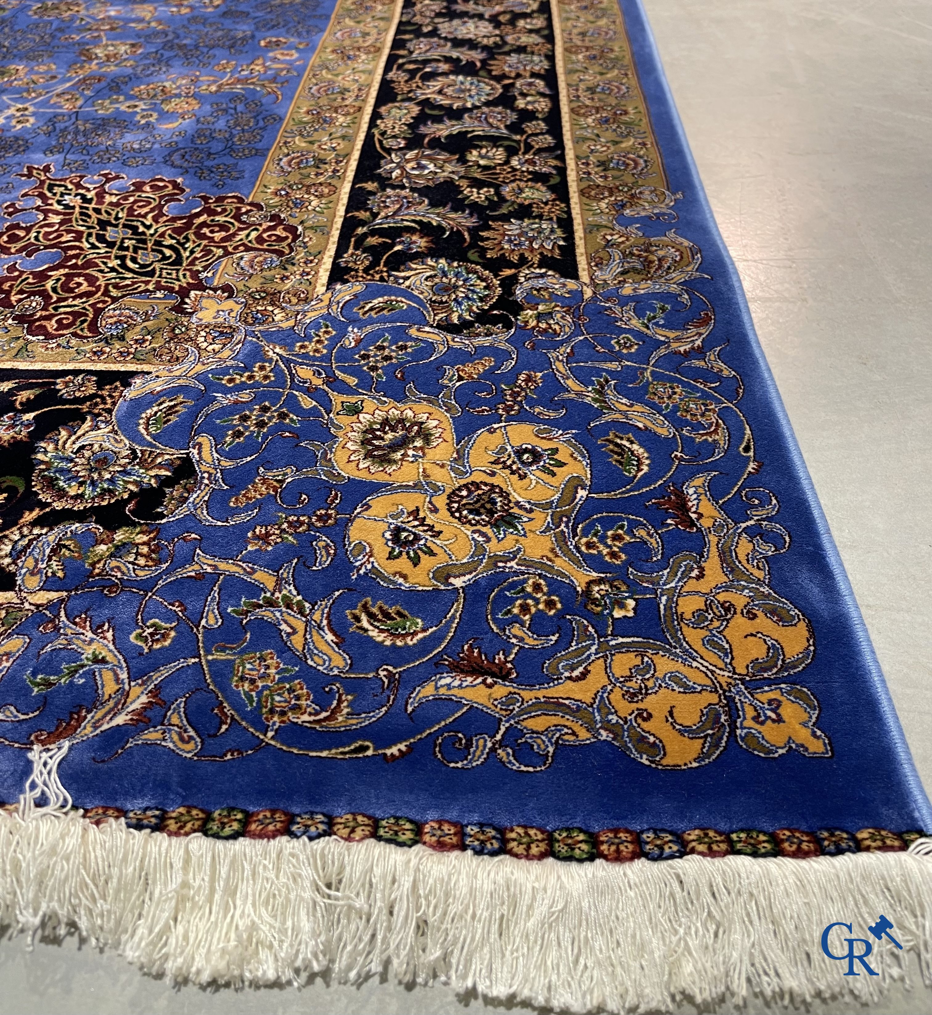 Carpets. Exceptional silk carpet with floral decor on a blue background.