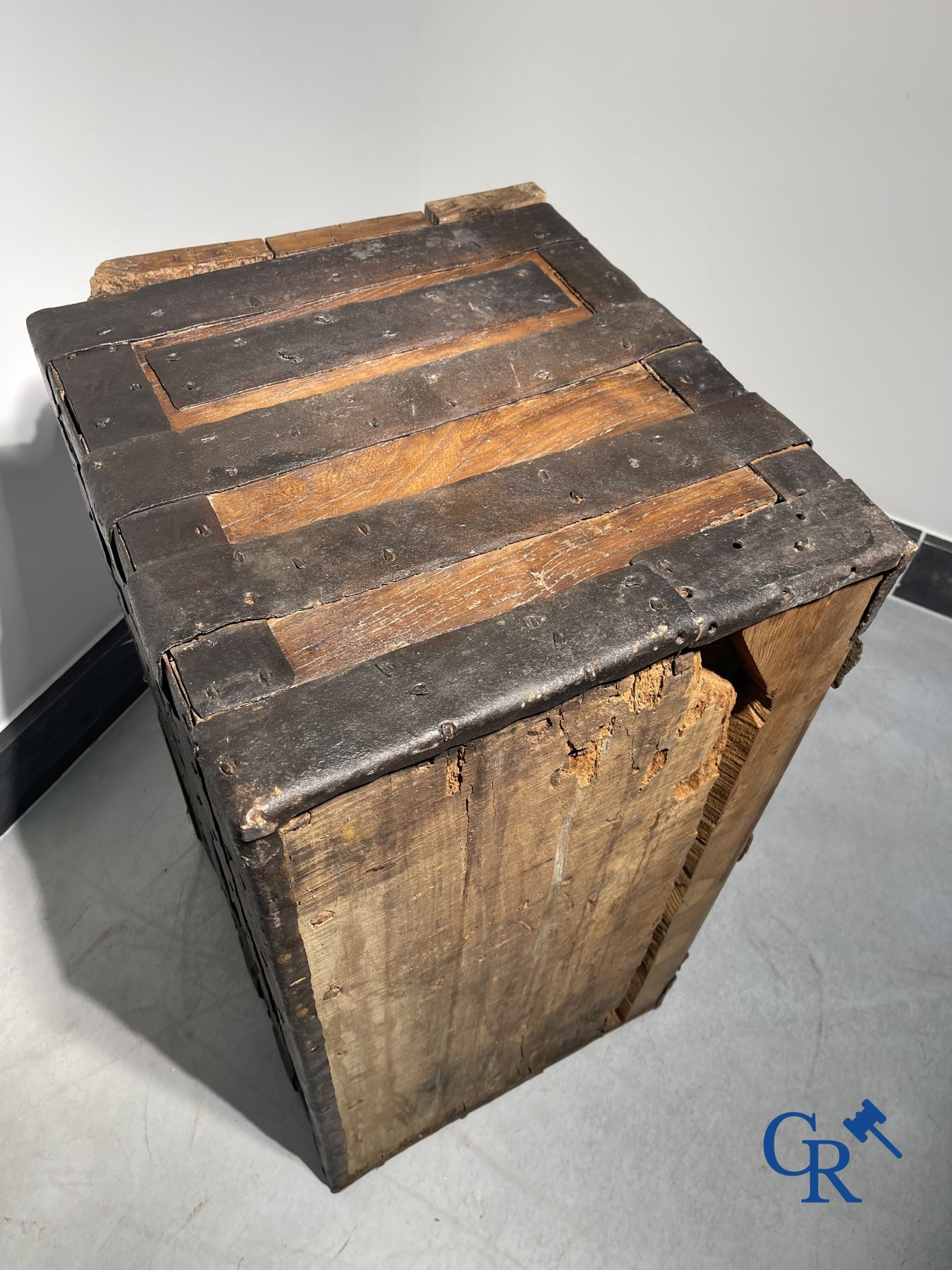 Antique wooden chest with hardware and lockwork in forging.