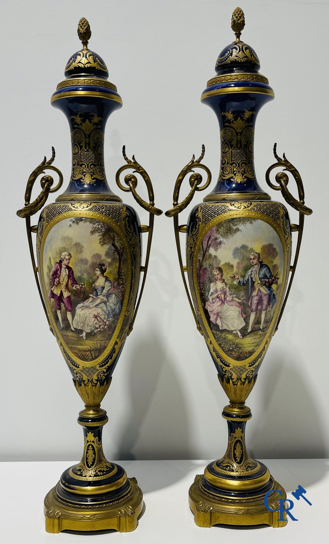 Sèvres: Poitevin. Pair of large vases in faience and bronze frames with romantic scenes. LXVI style. 19th-20th century.