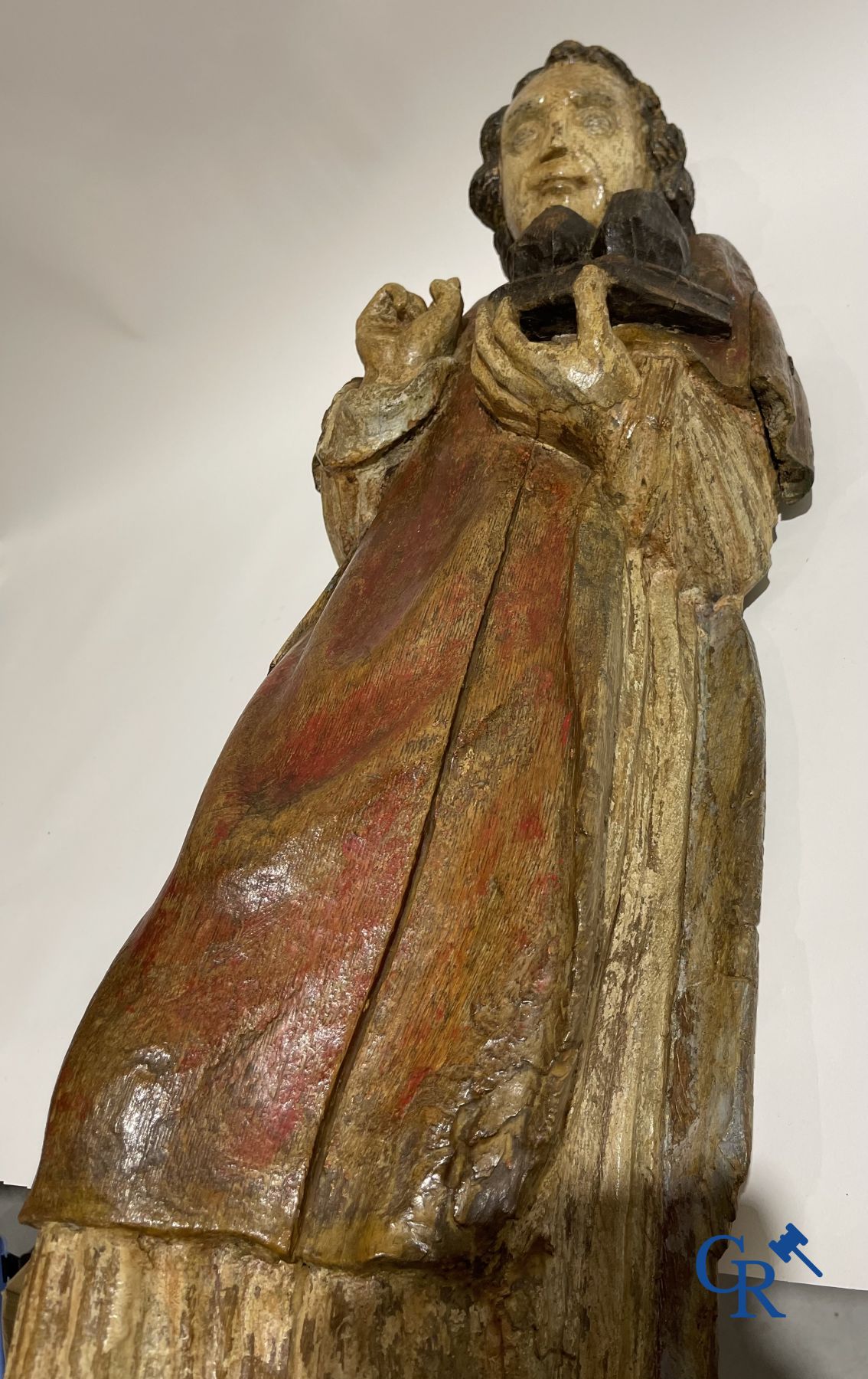 Wooden sculpture: Polychrome wood sculpture of a saint. Saint Stephen. Probably 17th century.