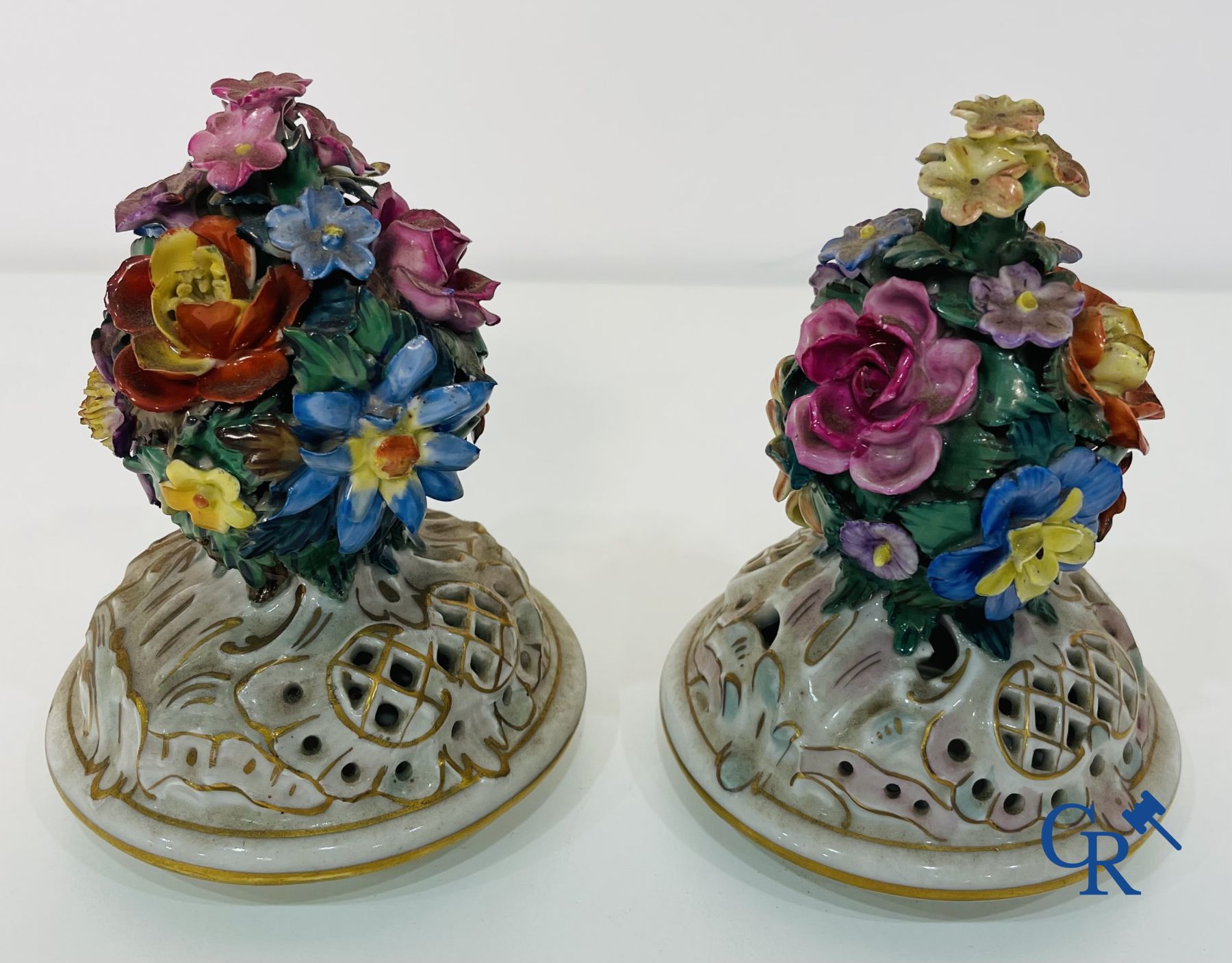 Dresden: A pair of openwork porcelain lid vases.