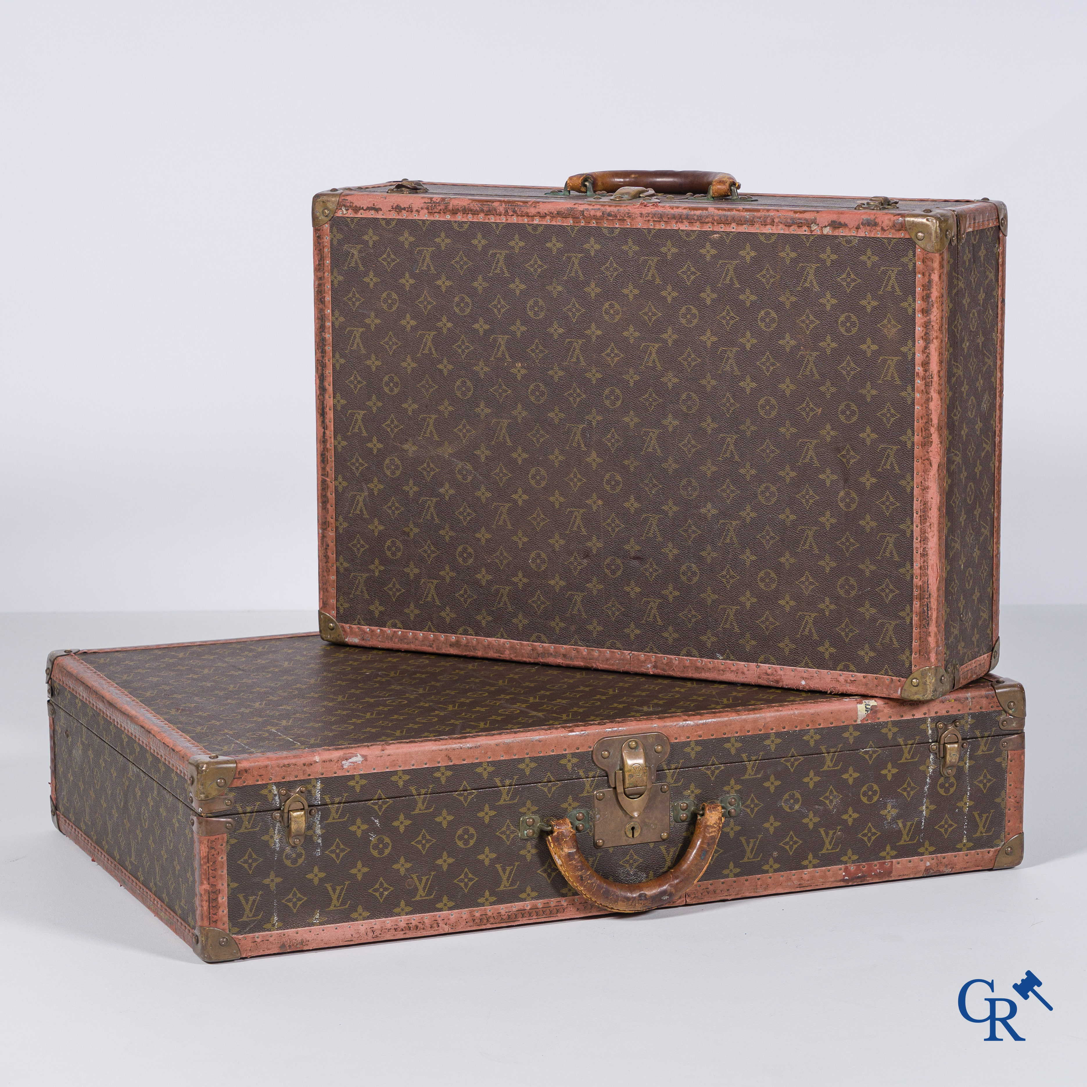 Louis Vuitton, 2 suitcases of which 1 with a label Av. Marceau 78 bis Paris and numbered 982010.