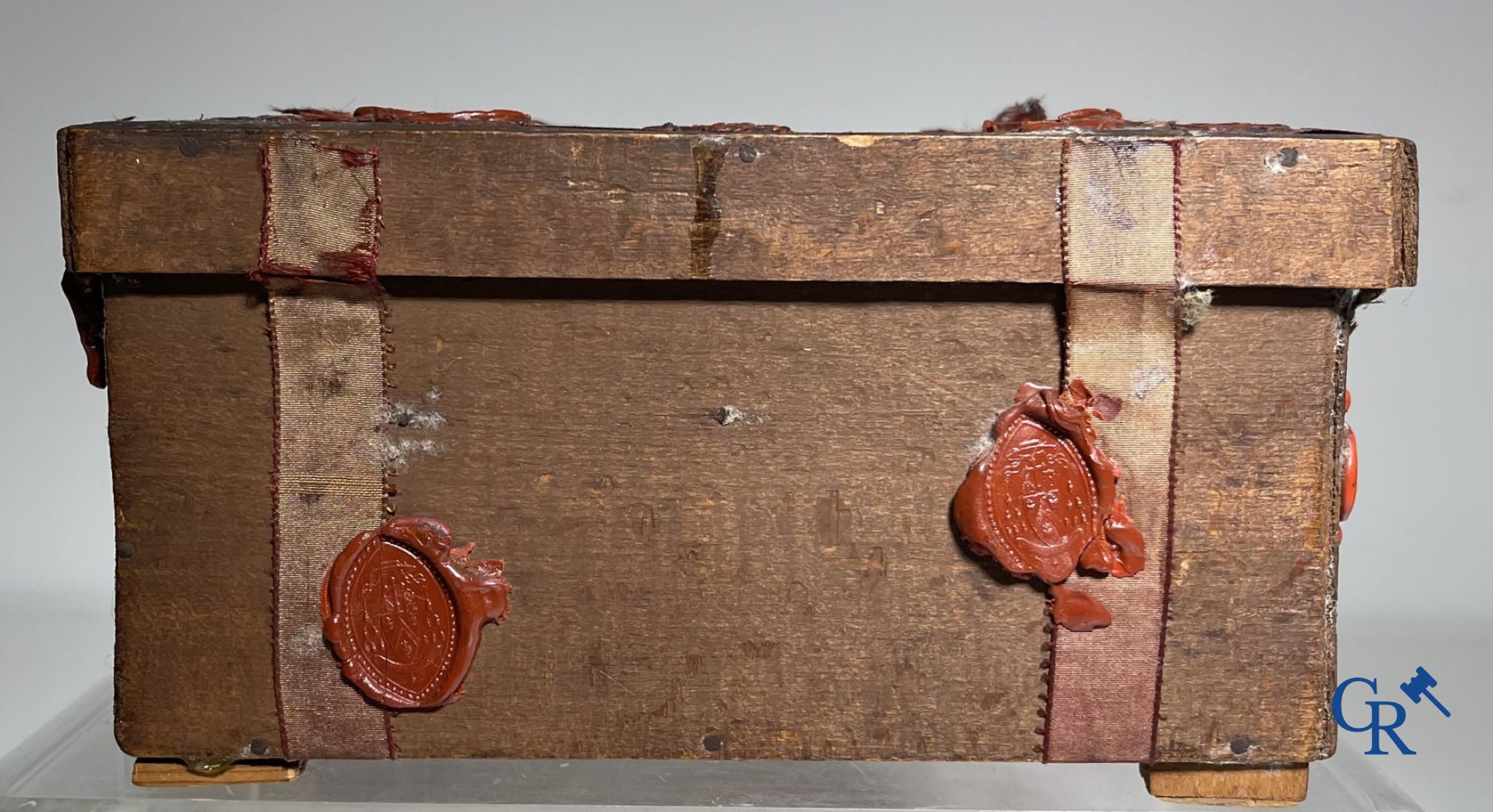 An antique wooden reliquary sealed with wax seals. Early 19th century.