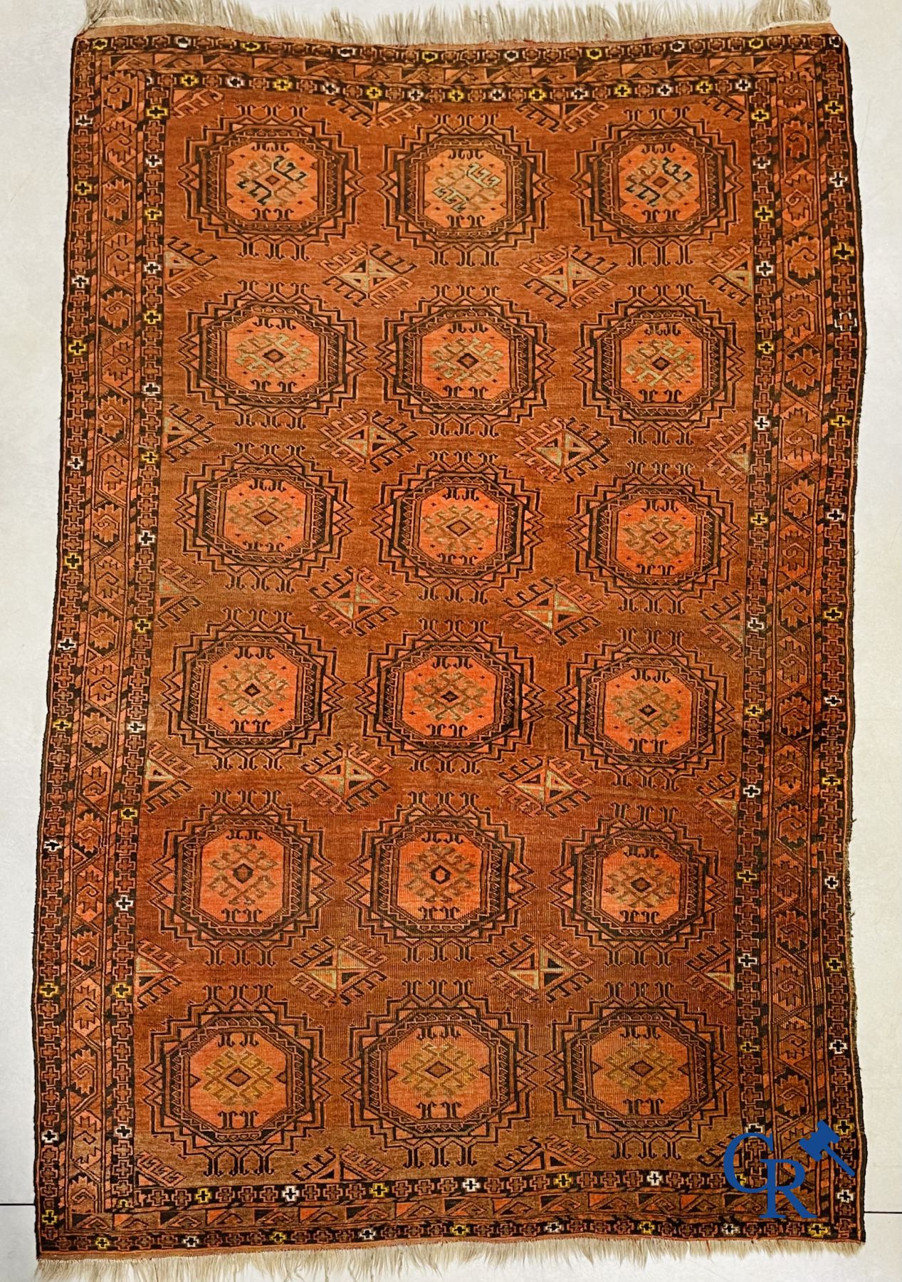 Oriental carpets: Large antique oriental carpet.