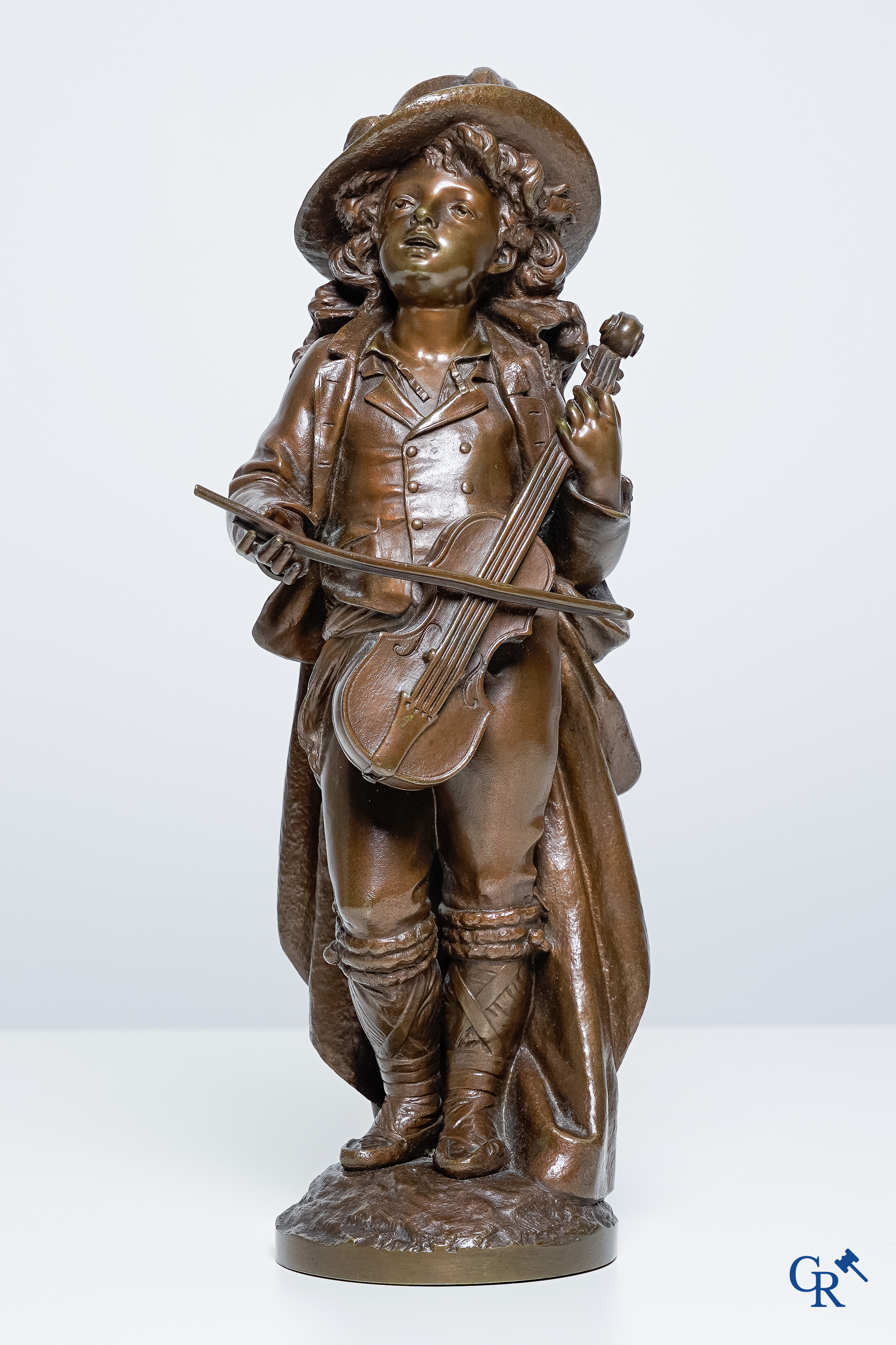 Adolphe Maubach. Bronze statue with brown patina. The young cellist. Signed A Maubach.