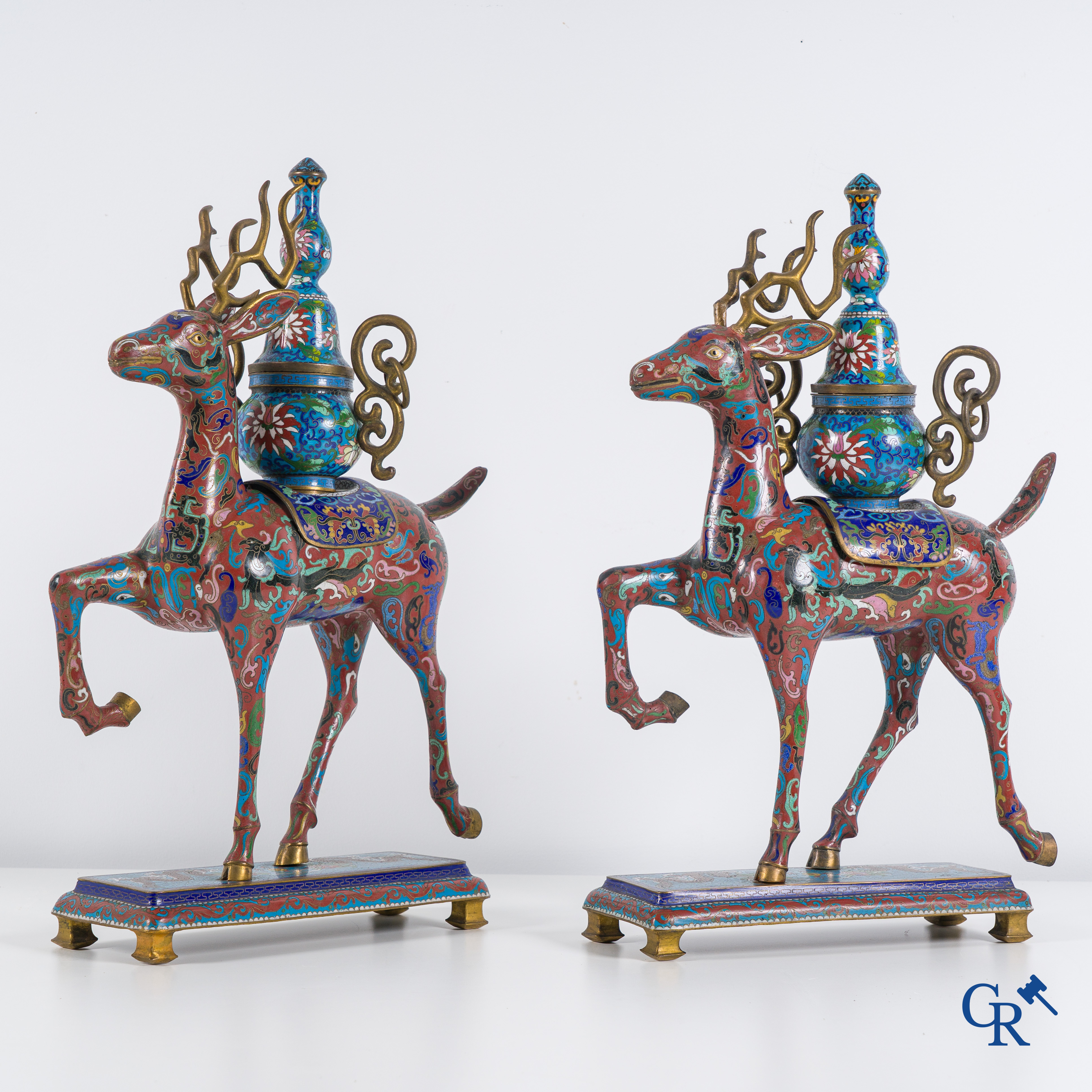 Asian Art: A pair of Chinese cloisonné incense burners in the shape of deer. China, 19th-20th century.