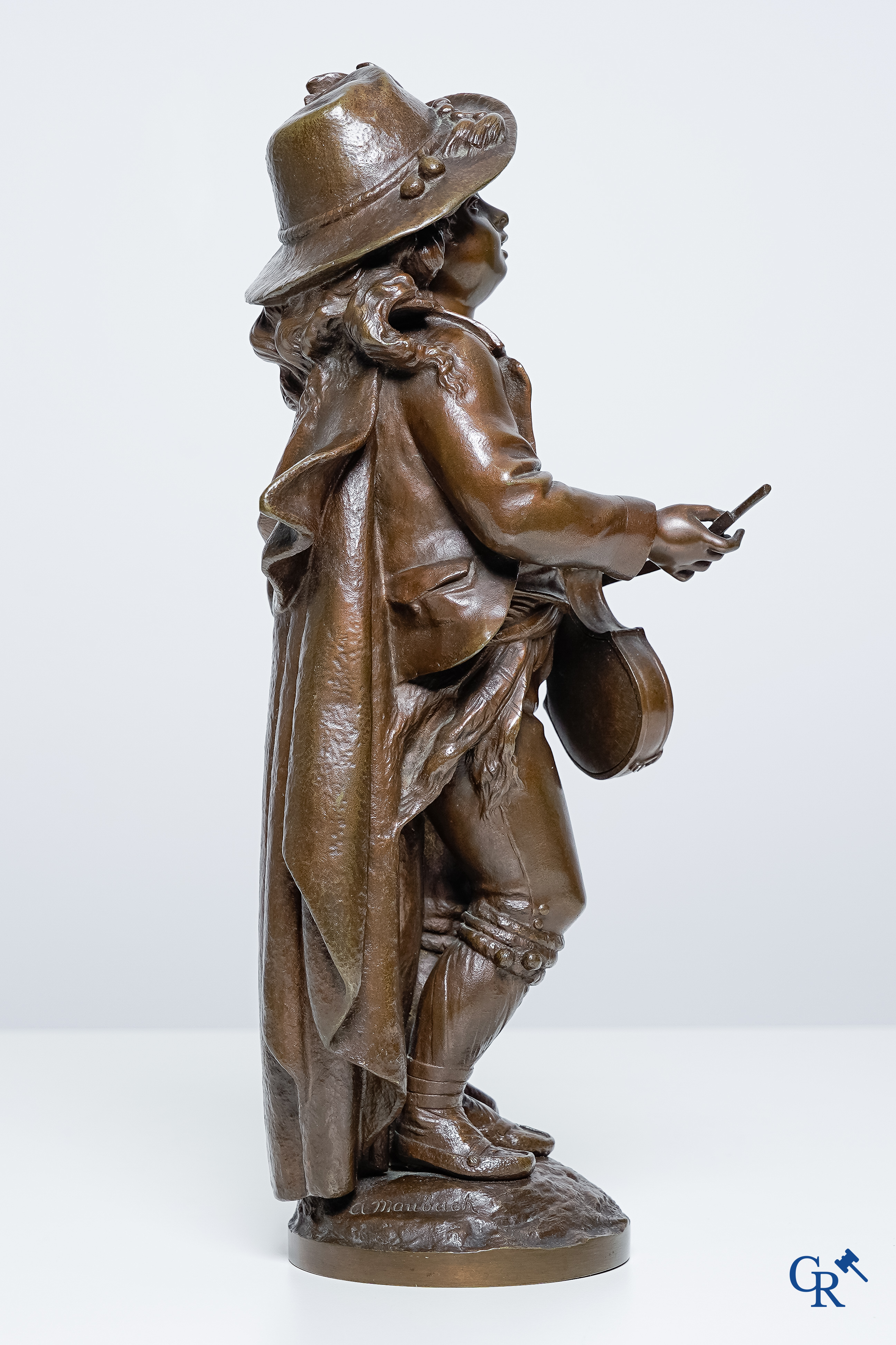 Adolphe Maubach. Bronze statue with brown patina. The young cellist. Signed A Maubach.