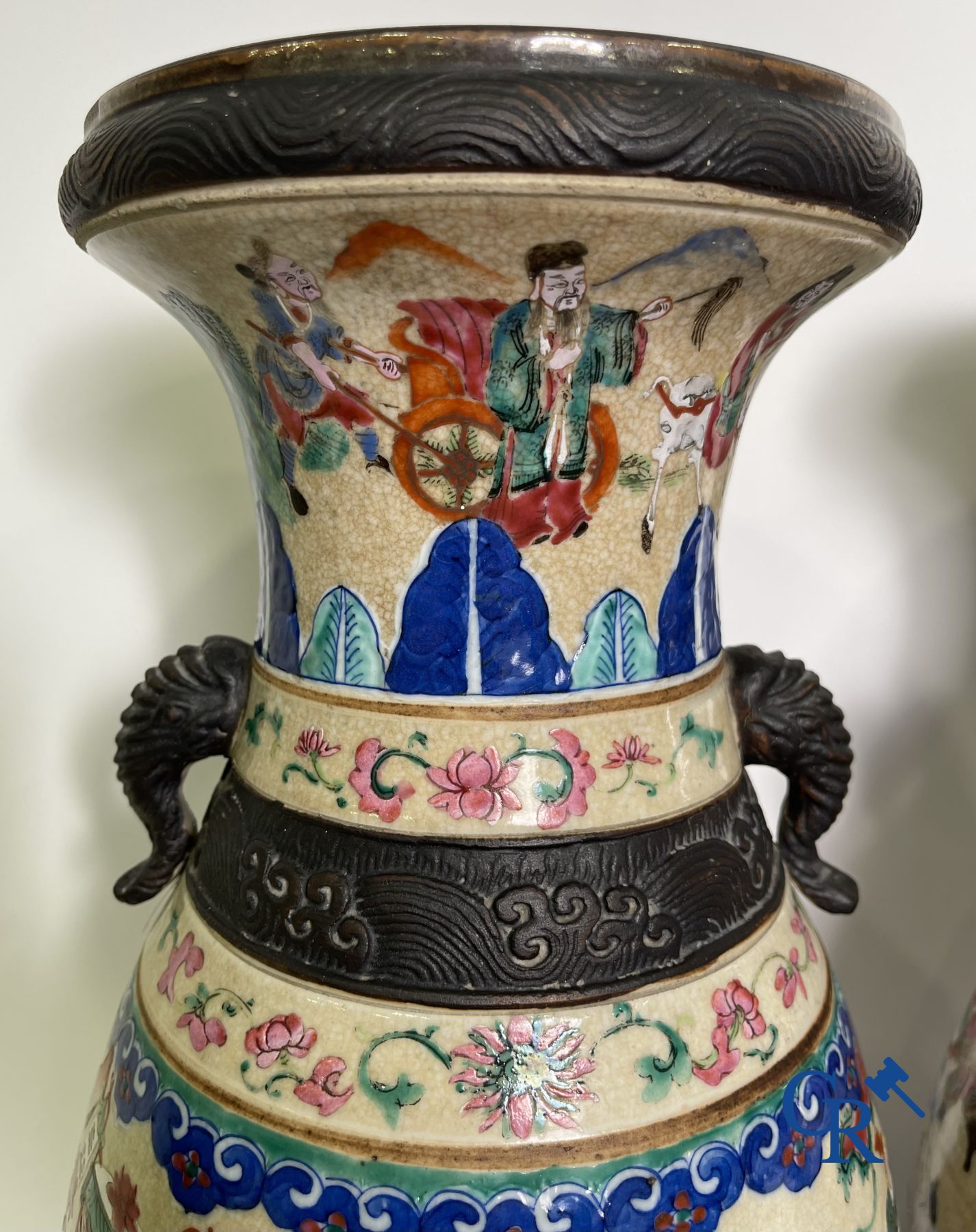 Asian Art: A pair of Chinese Nanking vases with famille rose decor.